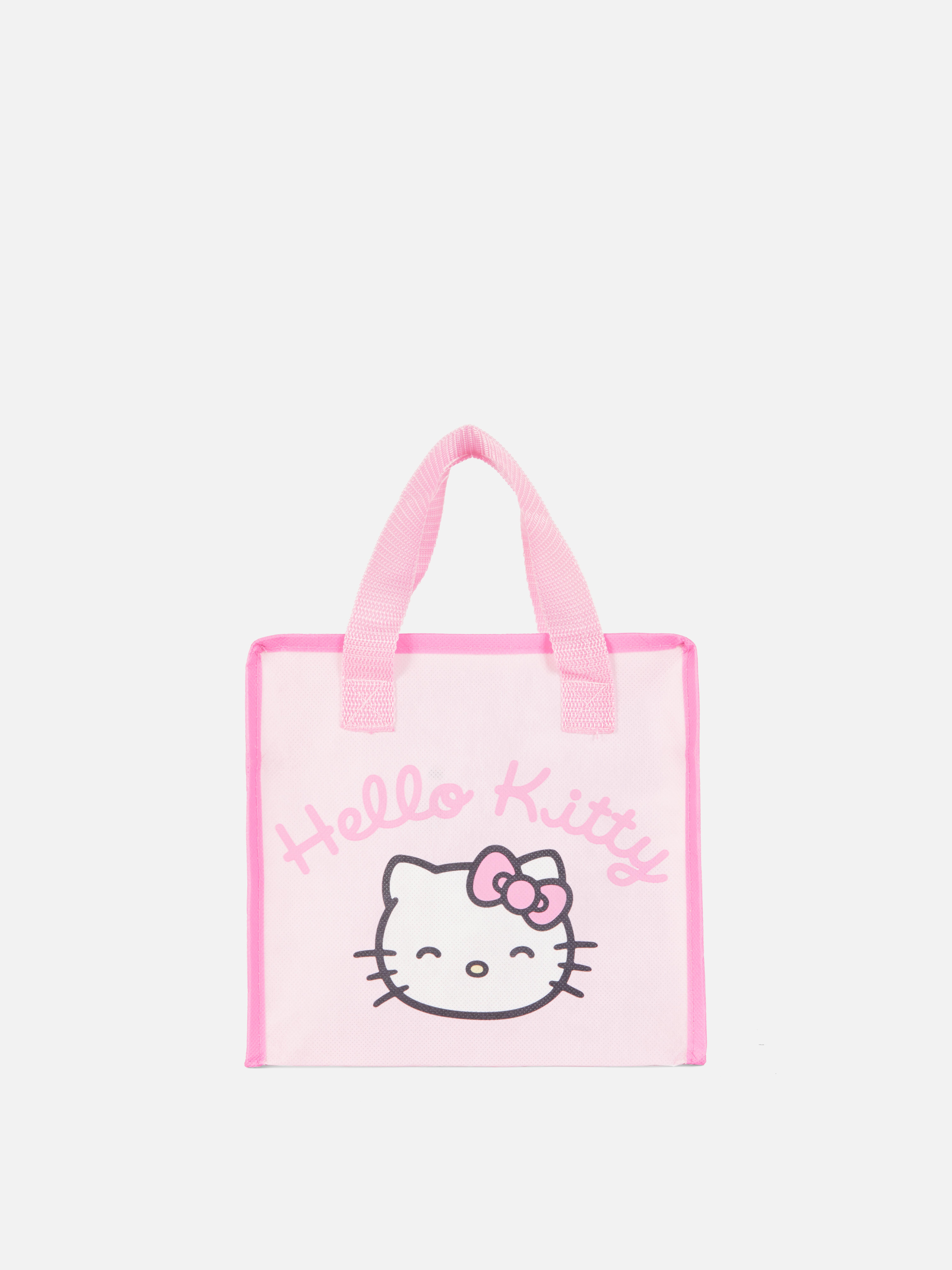 Geantă de prânz Hello Kitty O geantă de prânz cu fermoar, mânere și un design drăguț cu Hello Kitty