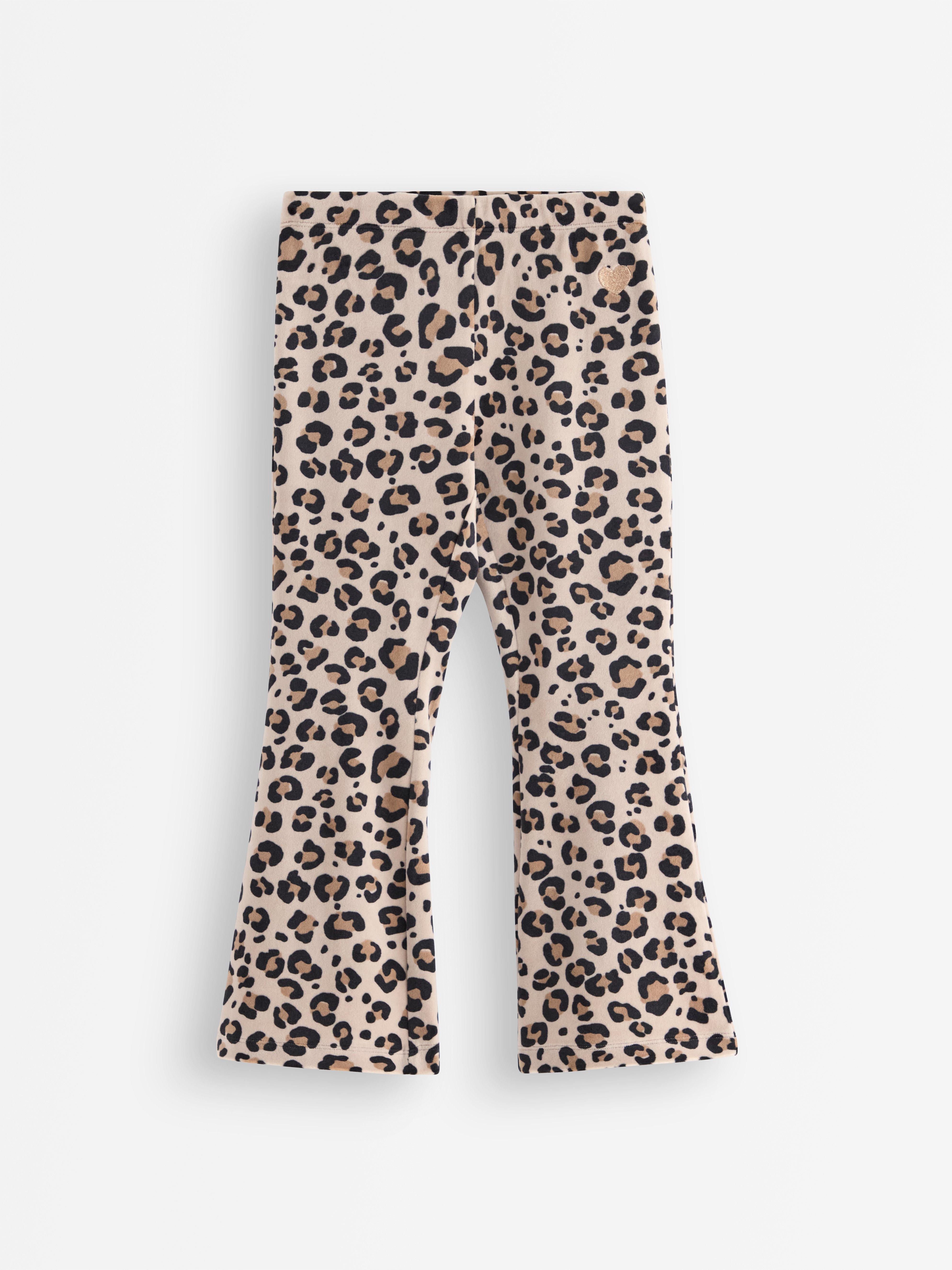 Calças legging flare em veludo bege