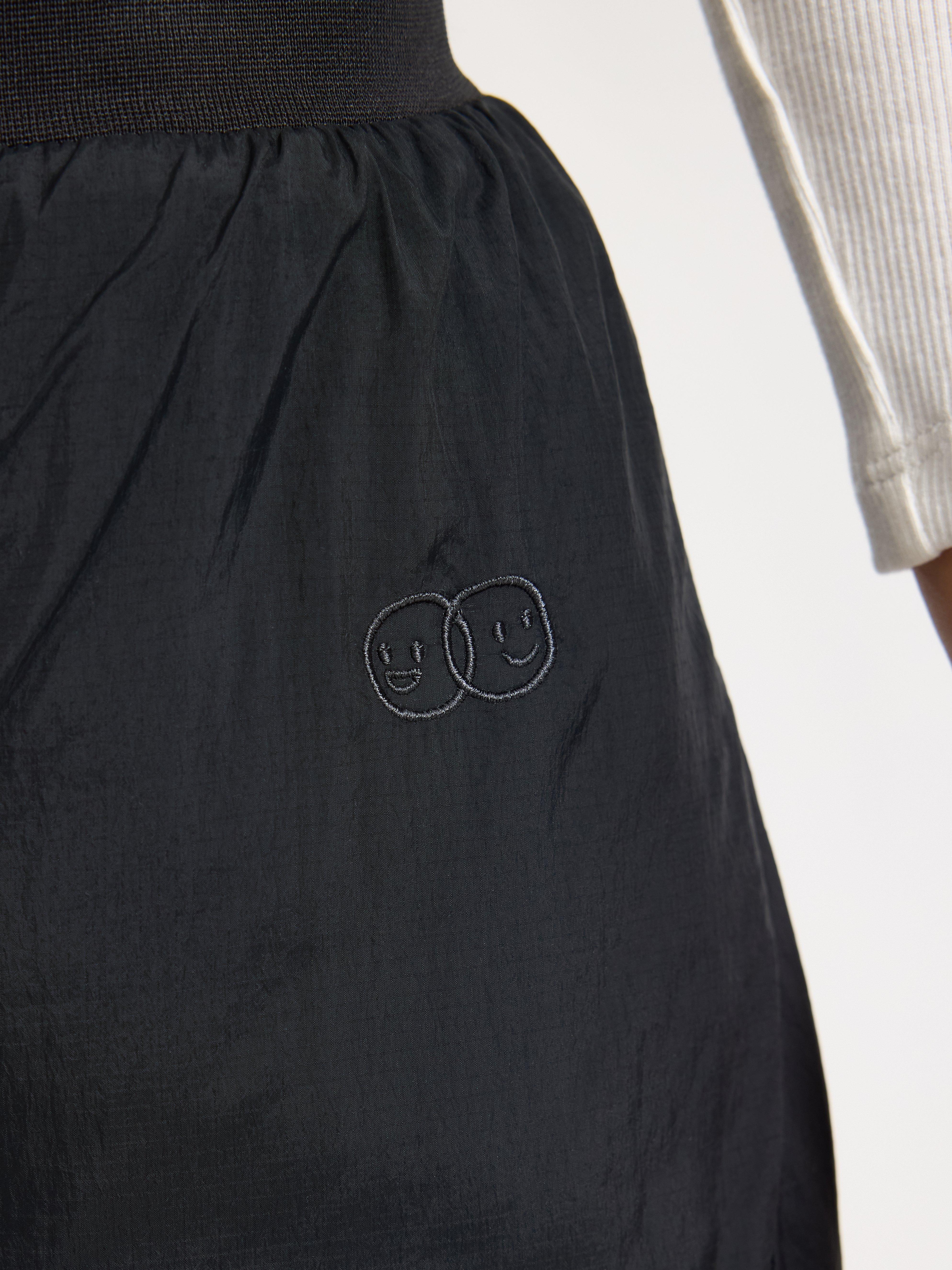 Pantalones ligeros, acolchados e impermeables – Ropa deportiva infantil negra