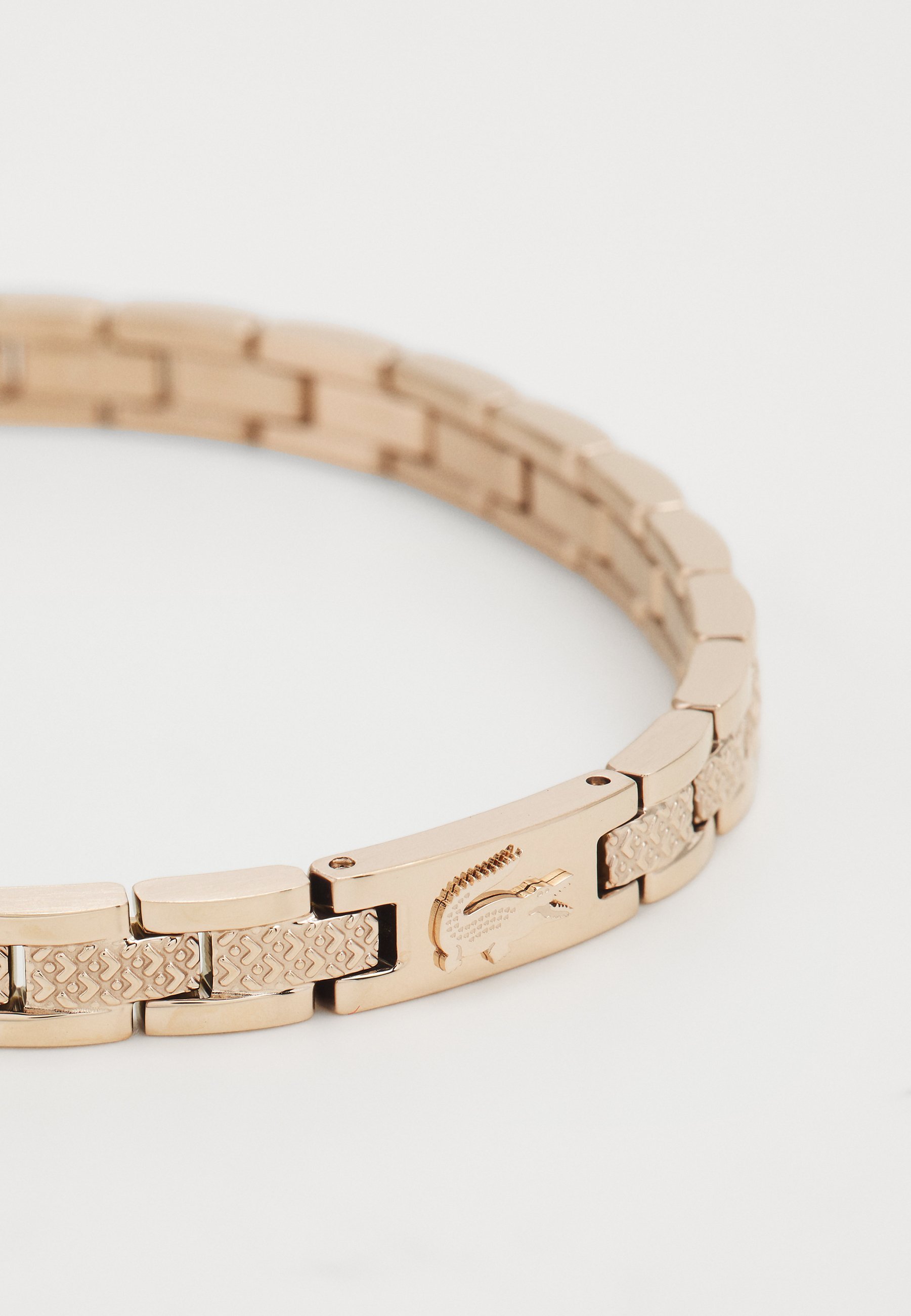 Pulseira Lacoste METROPOLE UNISSEX - cor ouro rosa