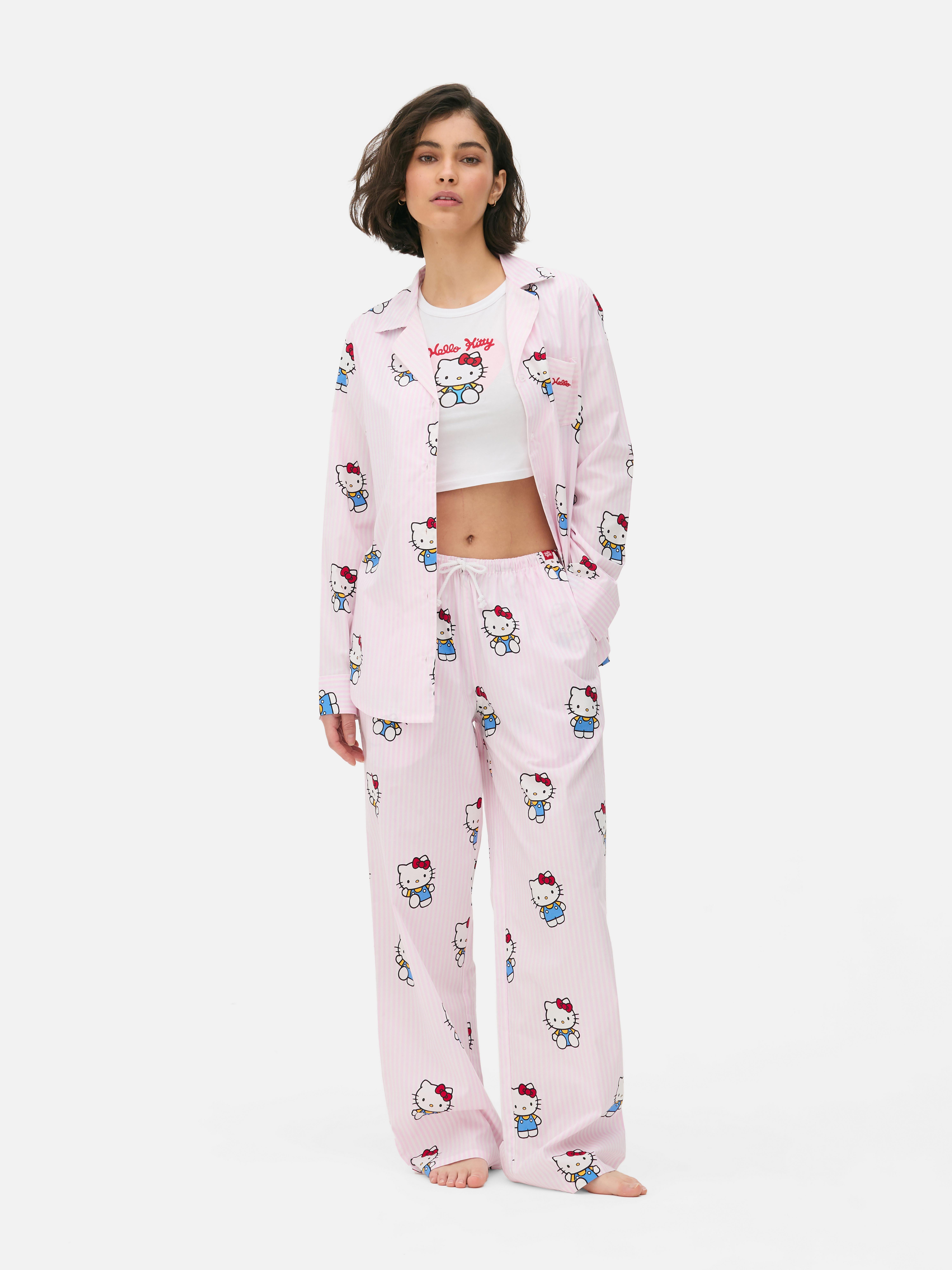 Pantaloni de pijama Hello Kitty și prietenii. Pantaloni de pijama cu șnur, buzunare laterale și personaje Hello Kitty.
