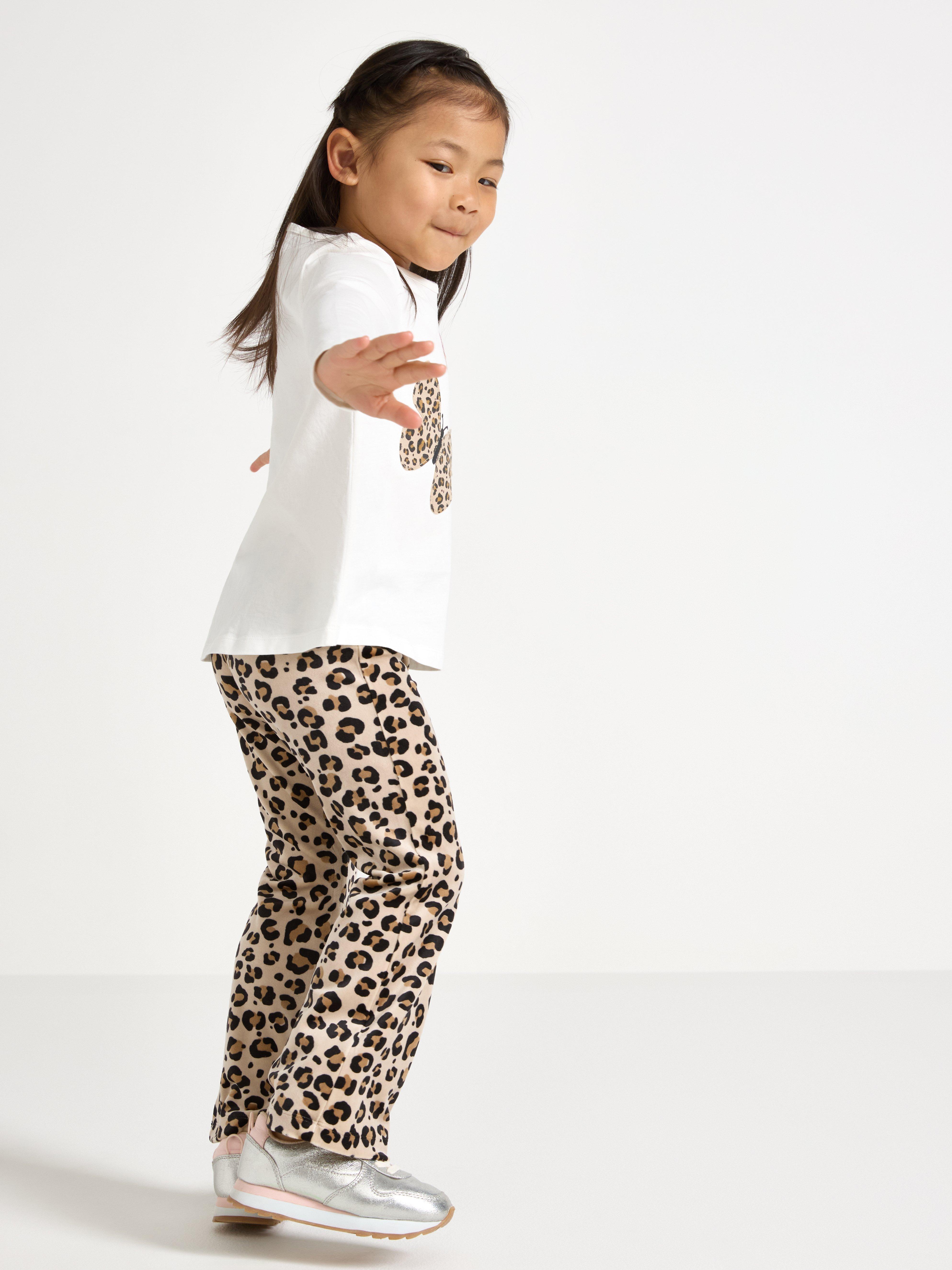 Calças legging flare em veludo bege