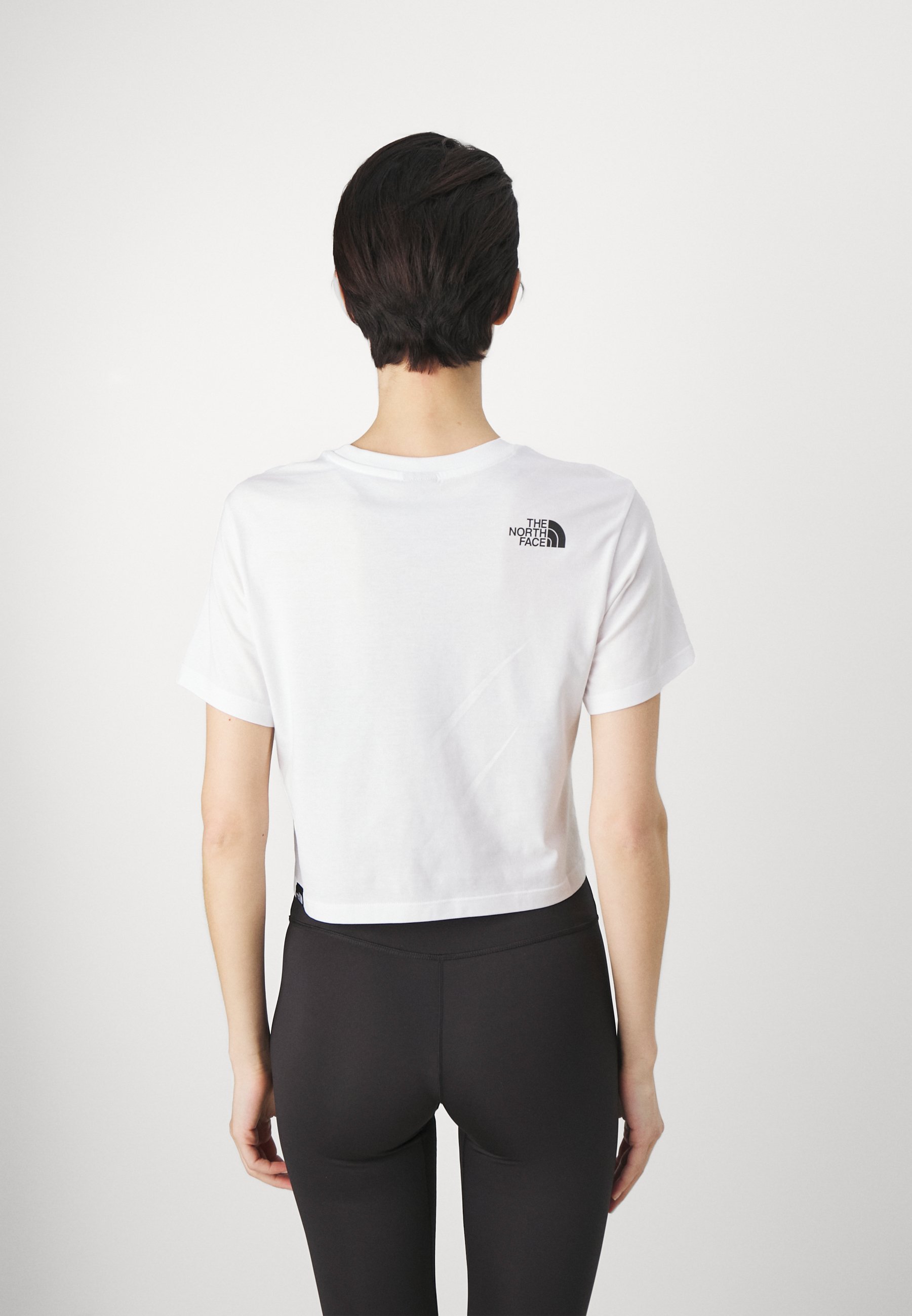 Maglietta The North Face SIMPLE DOME CROPPED SLIM TEE - Stampa - bianca