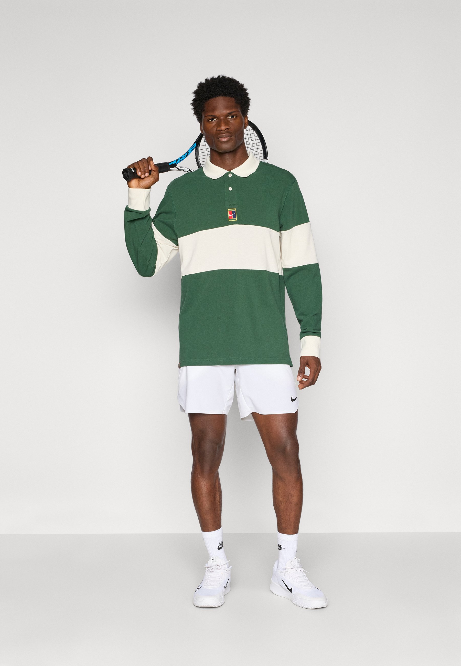 Nike Performance NIKECOURT HERITAGE - Poloshirt - vuren/licht ivoor
