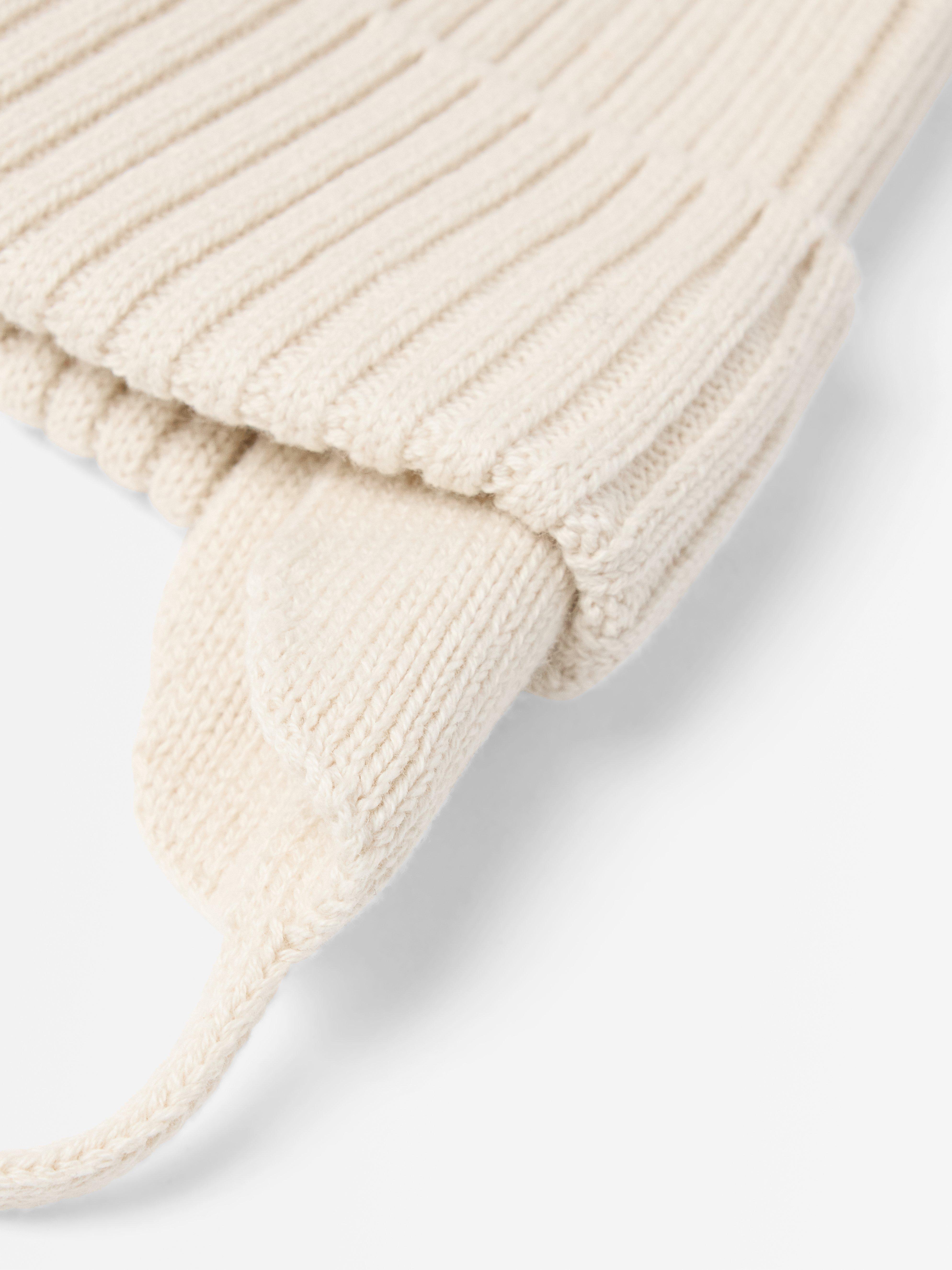 Strikket lue med pompon Lys beige