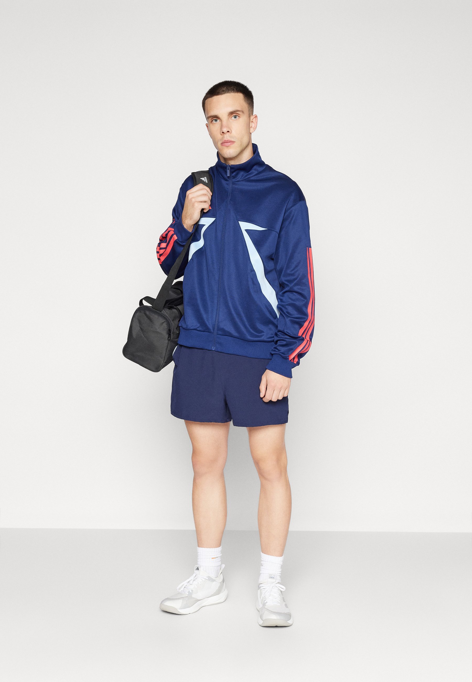 adidas Sportswear TIRO - Veste d'entraînement - bleu foncé/bleu fluo/rouge semi-transparent