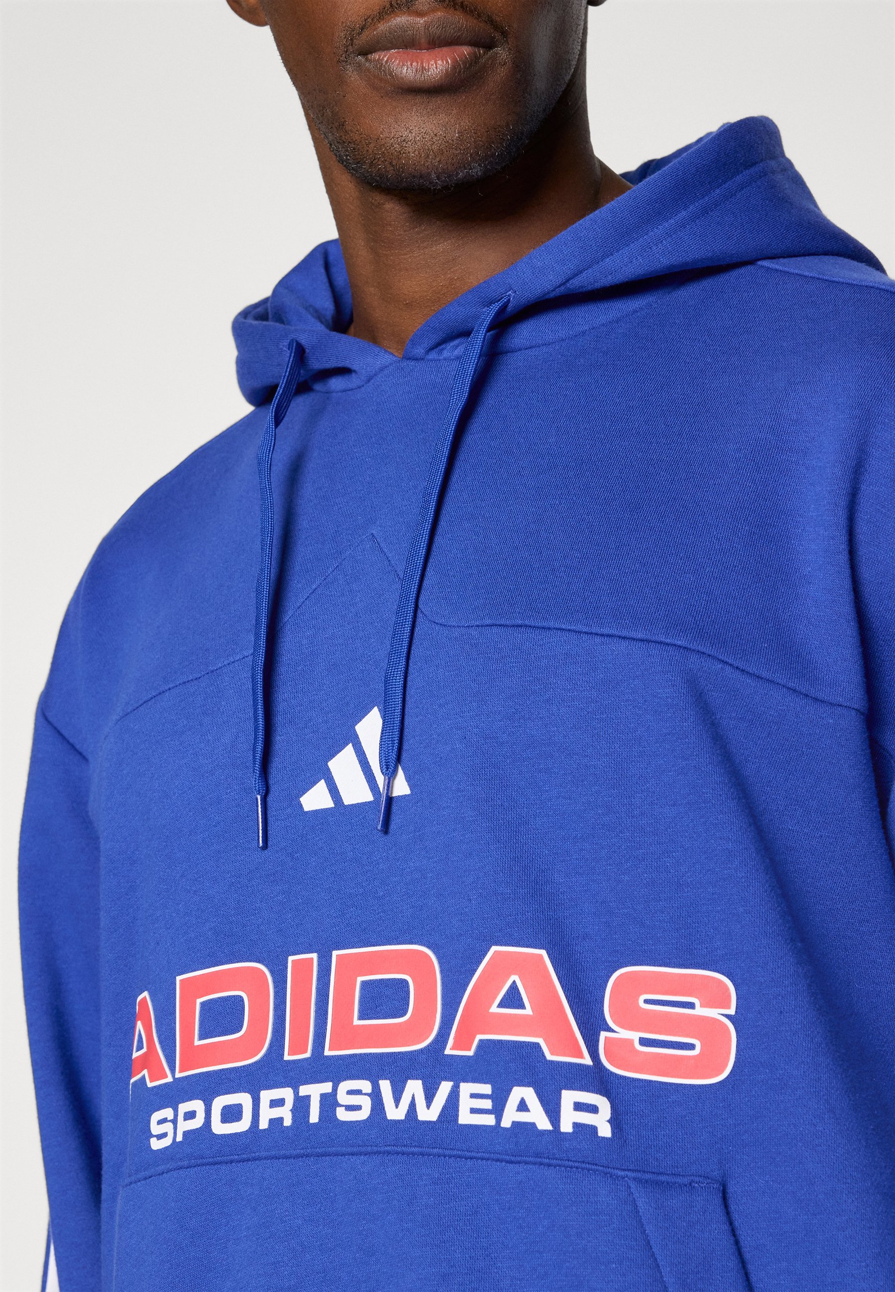 adidas Sportswear TIRO - Sweat à capuche - bleu semi-transparent
