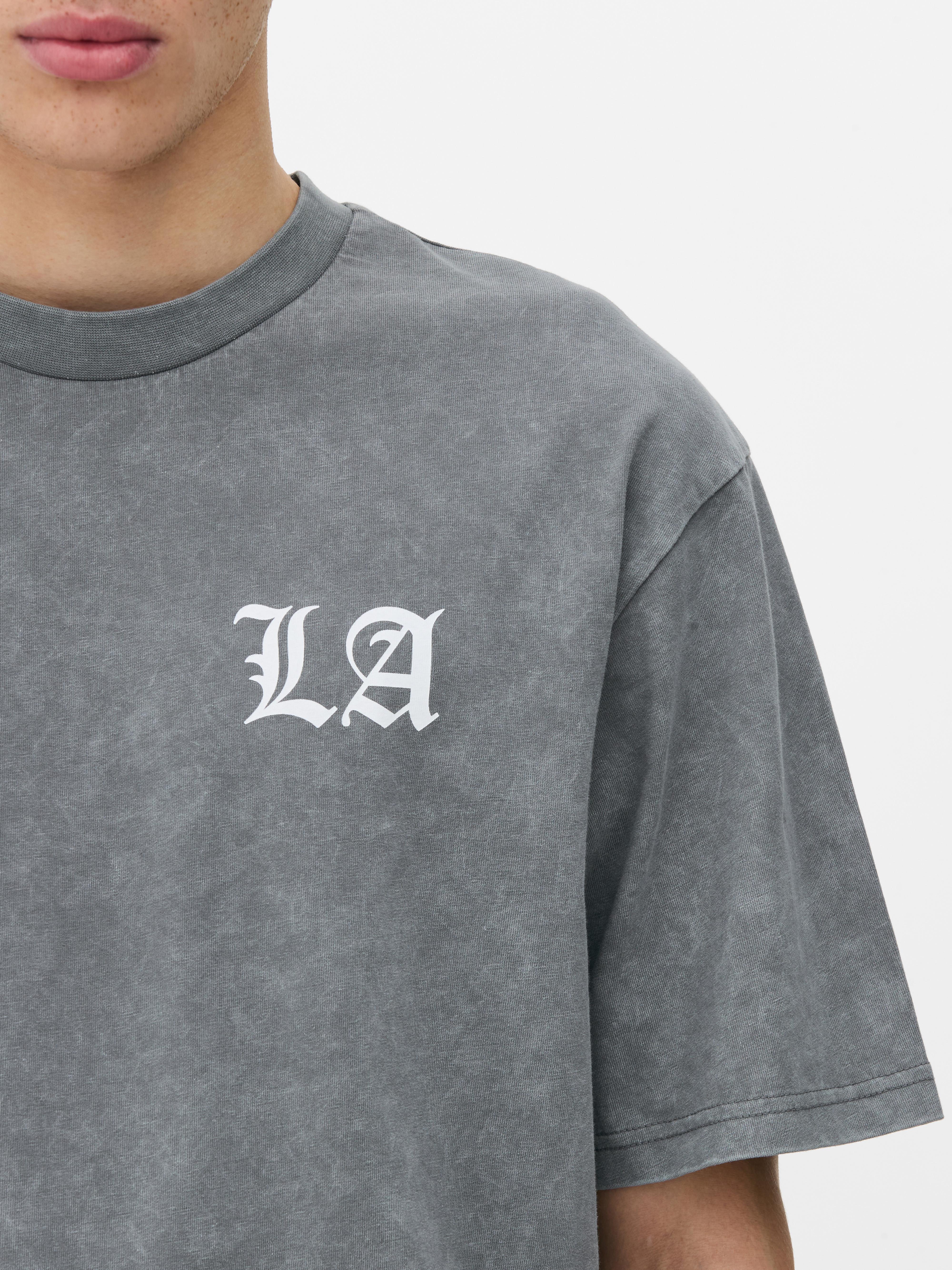 Tricou spălat cu imprimeu LA Angel. Toată lumea va citi ce scrie pe acest tricou vintage spălat.