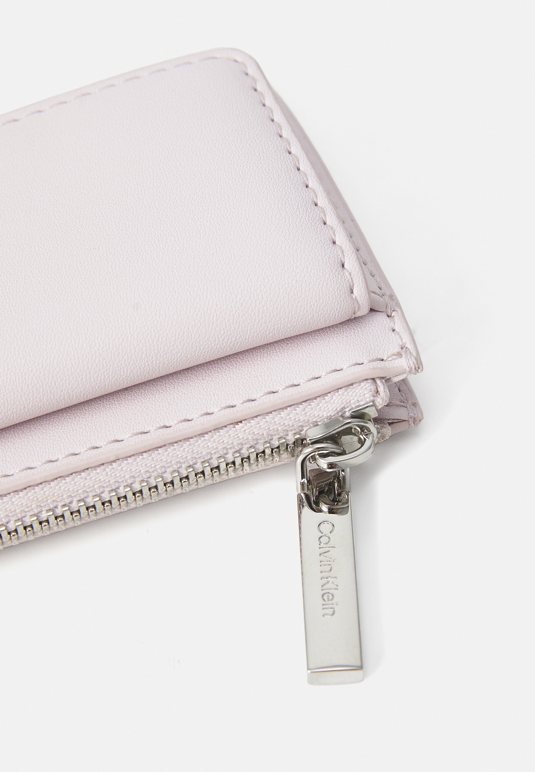 Calvin Klein MUST HOLDER ZIP - Portemonnee - orchidee ijs