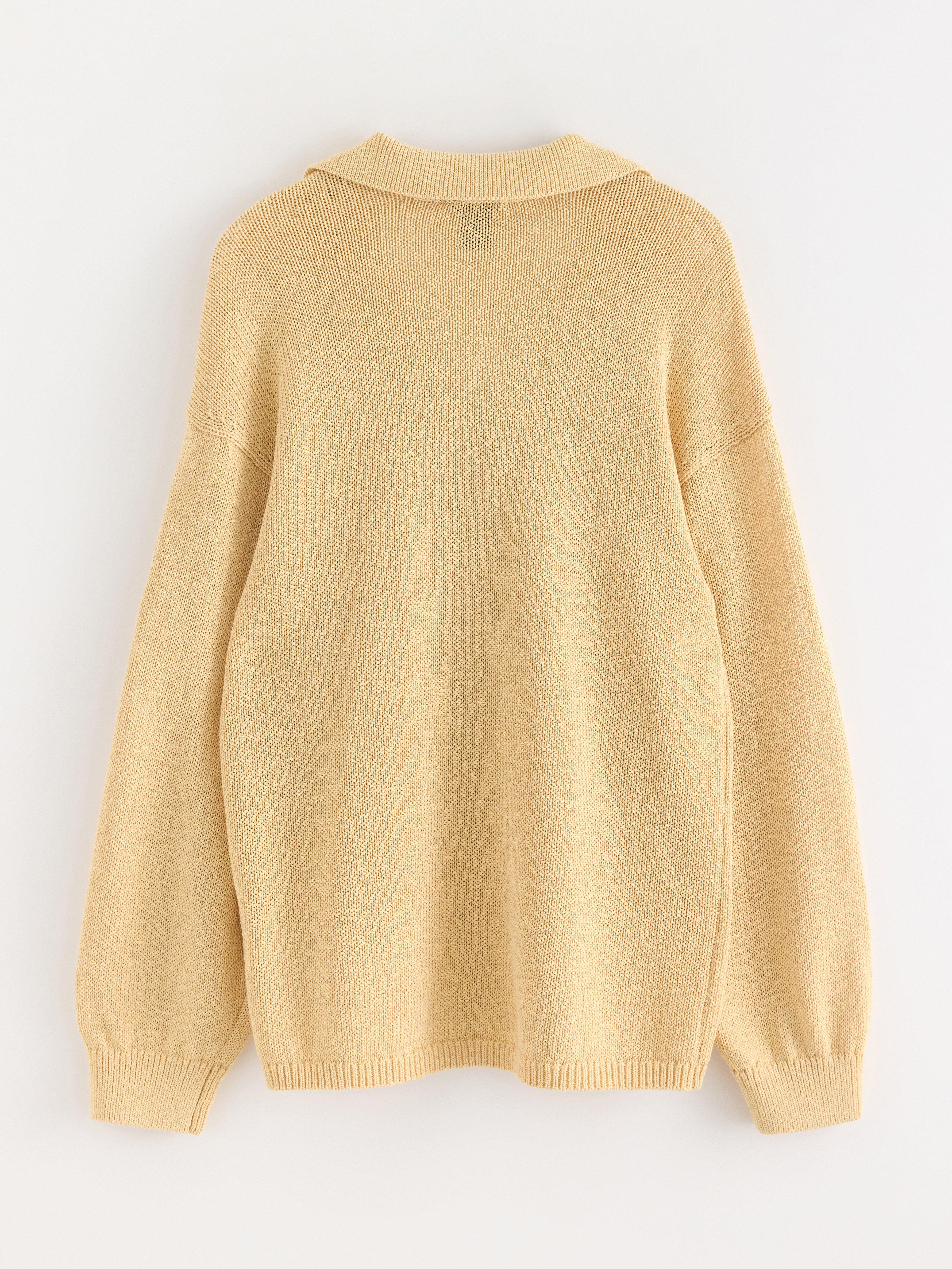Suéter de tricô amarelo