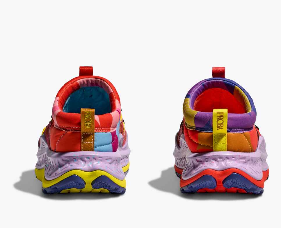 HOKA Agora, o primeiro estúdio Proba Vermillion Laranja/Dourado