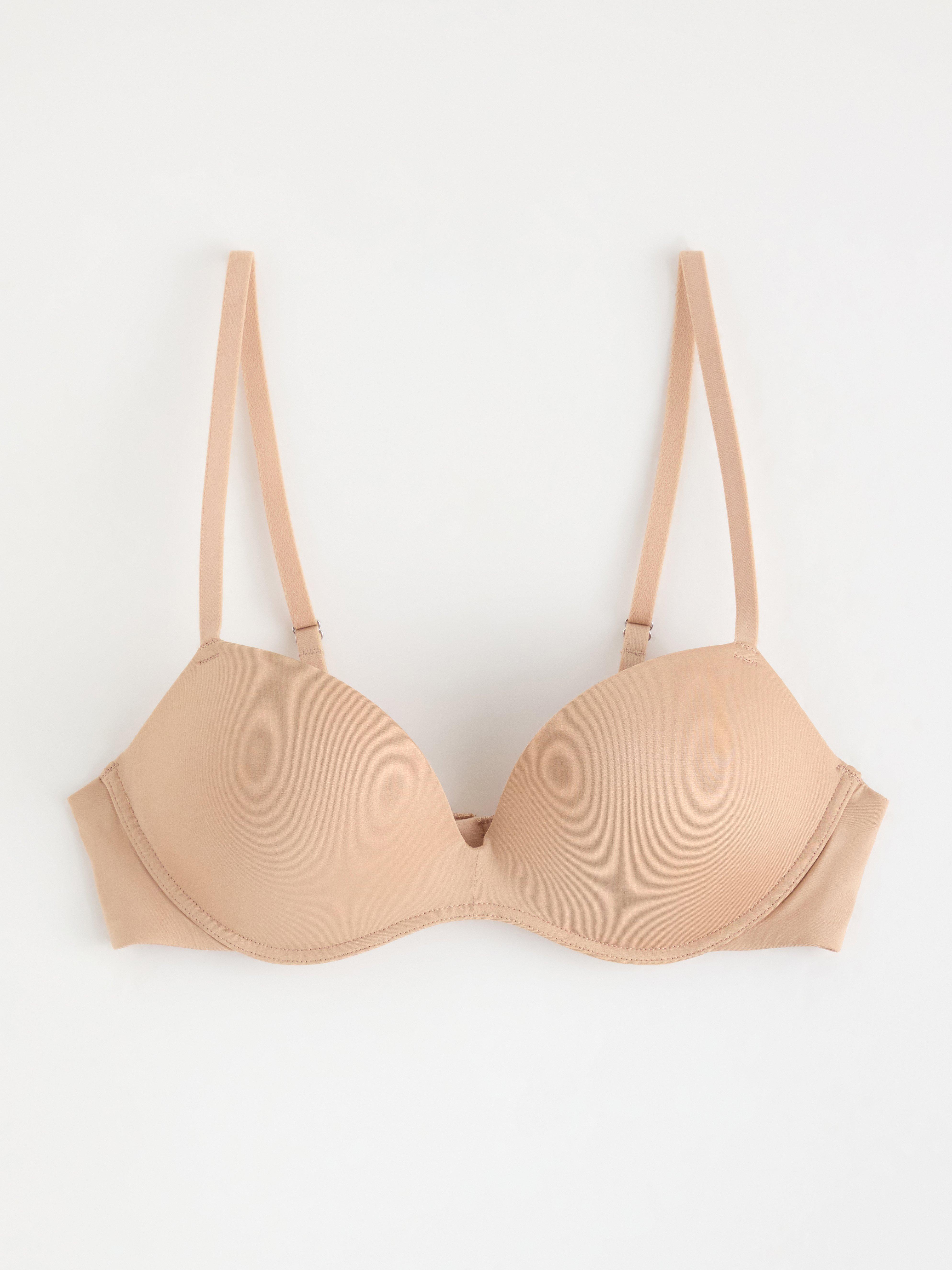 Sujetador Bygellös con efecto push-up, color beige.