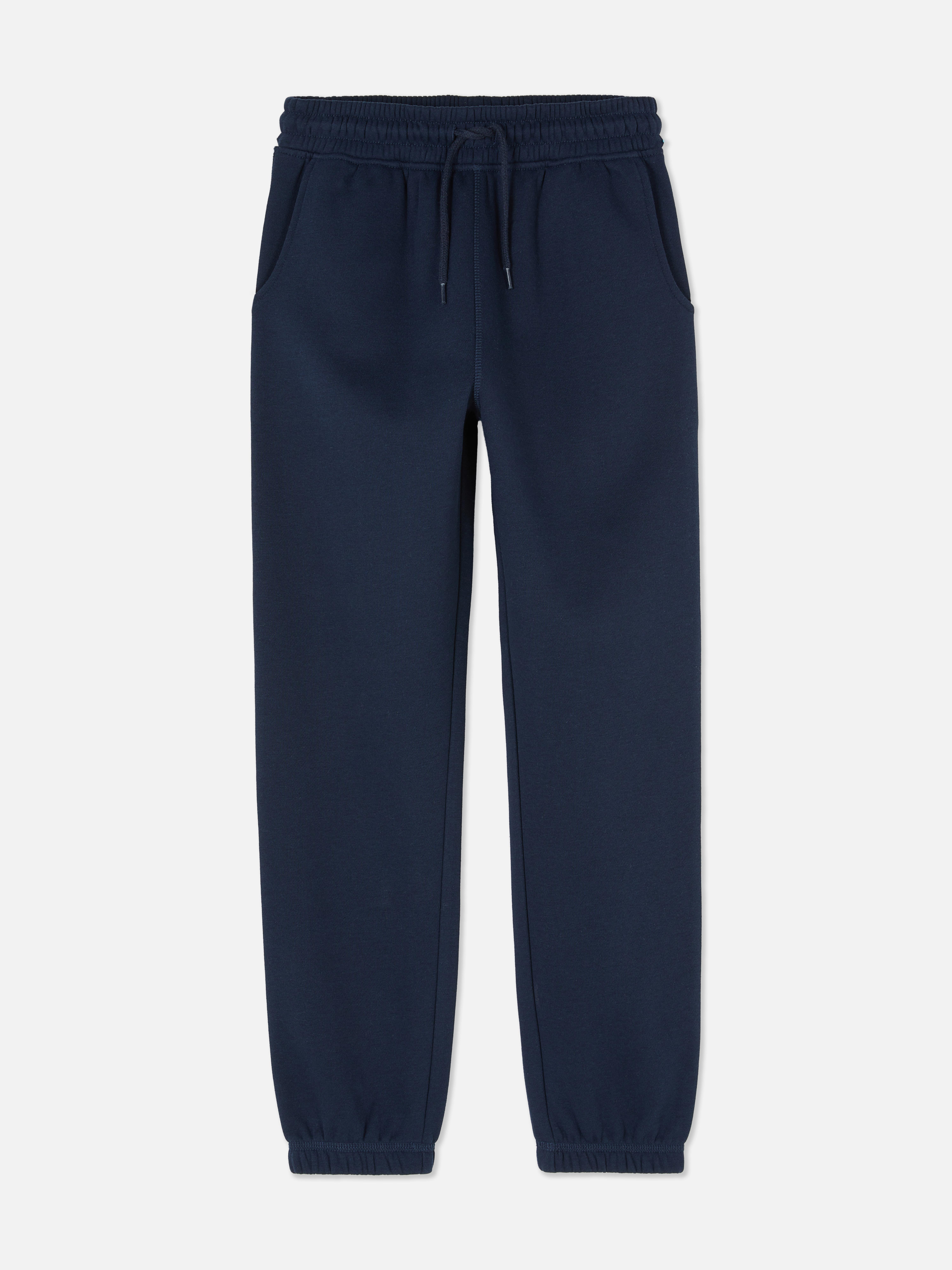 Jogginghose für Jungen mit Bund und Kordelzug. Lässige und bequeme Jogginghose mit Kordelzug im Bund, Seitentaschen und Bündchen.