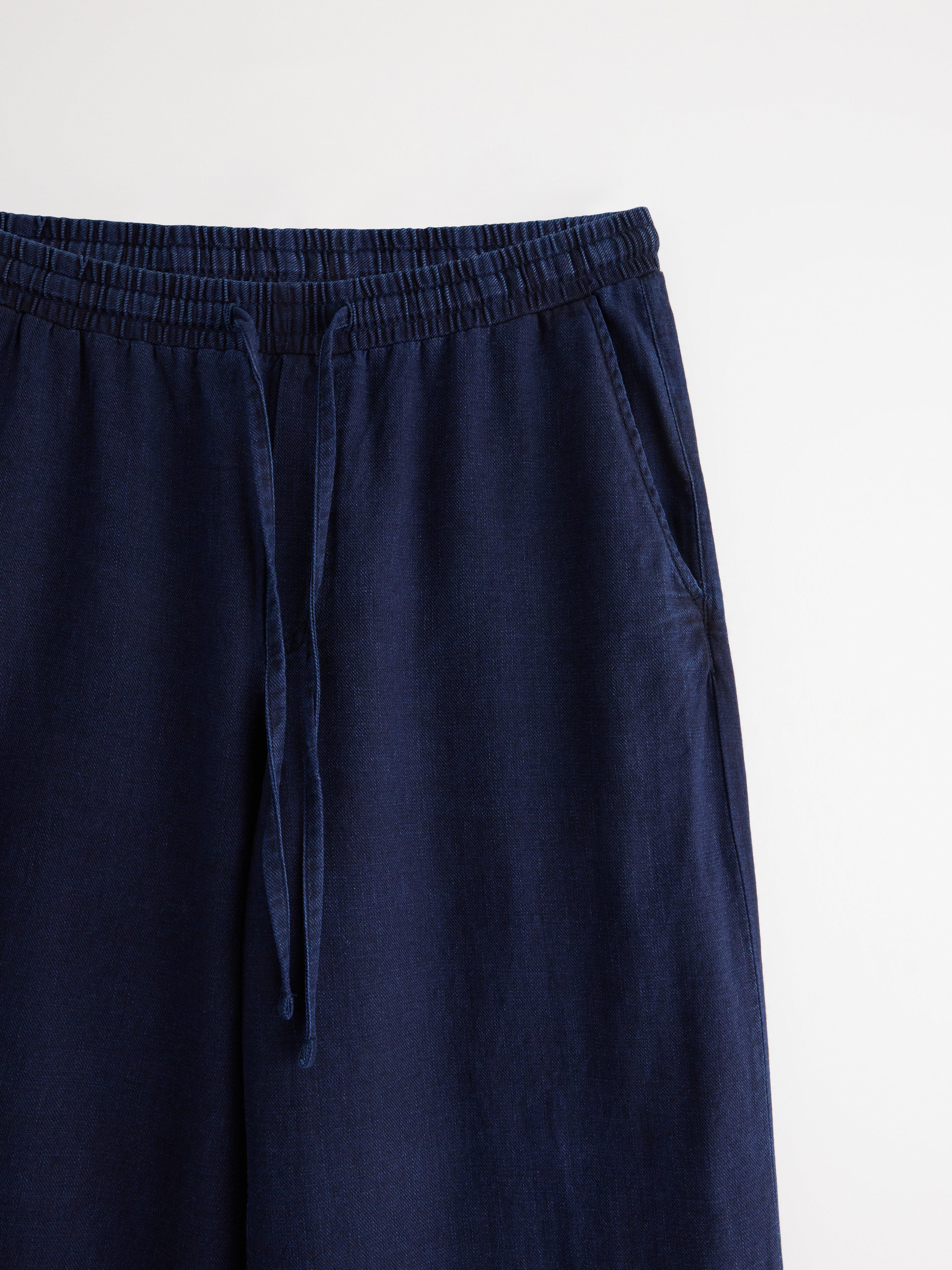 Pantalones vaqueros con cordón ajustable, color azul vaquero.