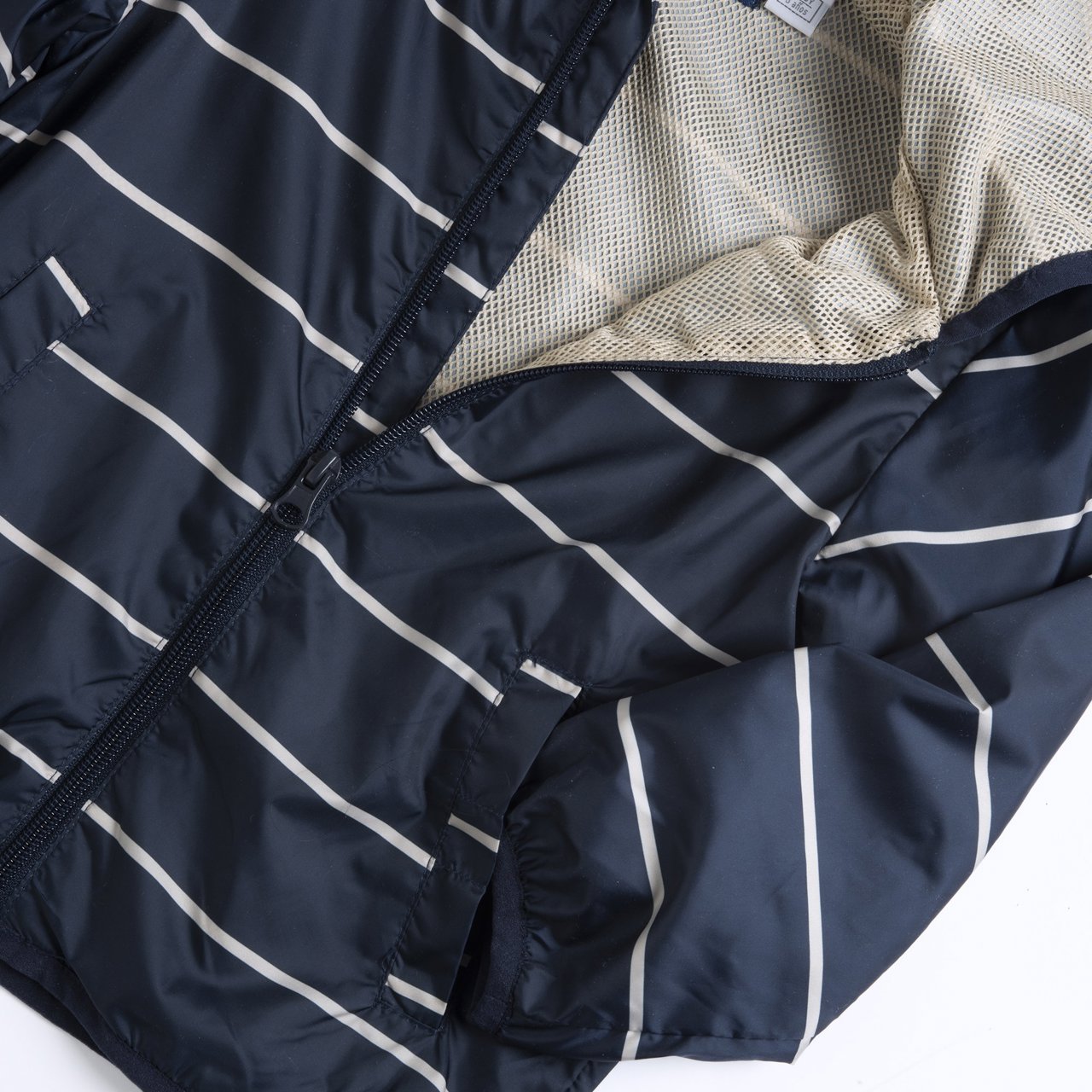 Jachetă vânt bleumarin cu dungi