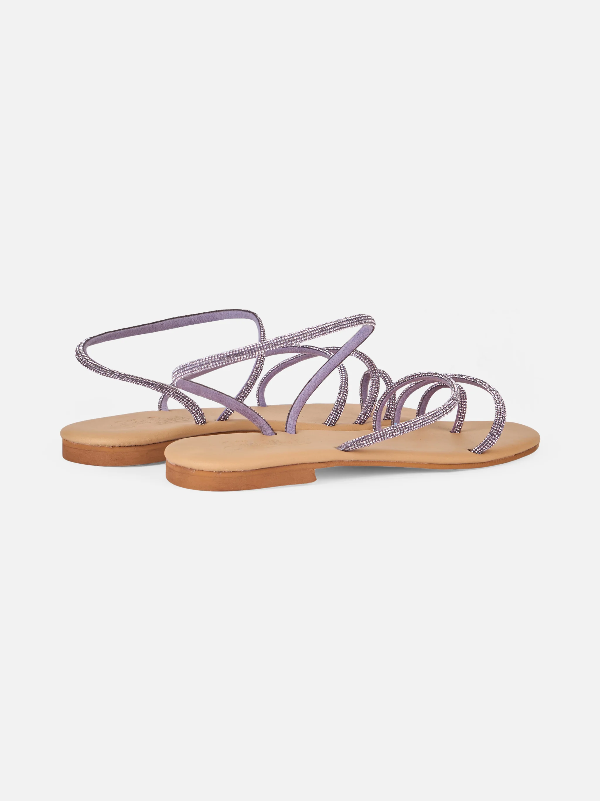 Platte sandalen met ring en lila strass-steentjes