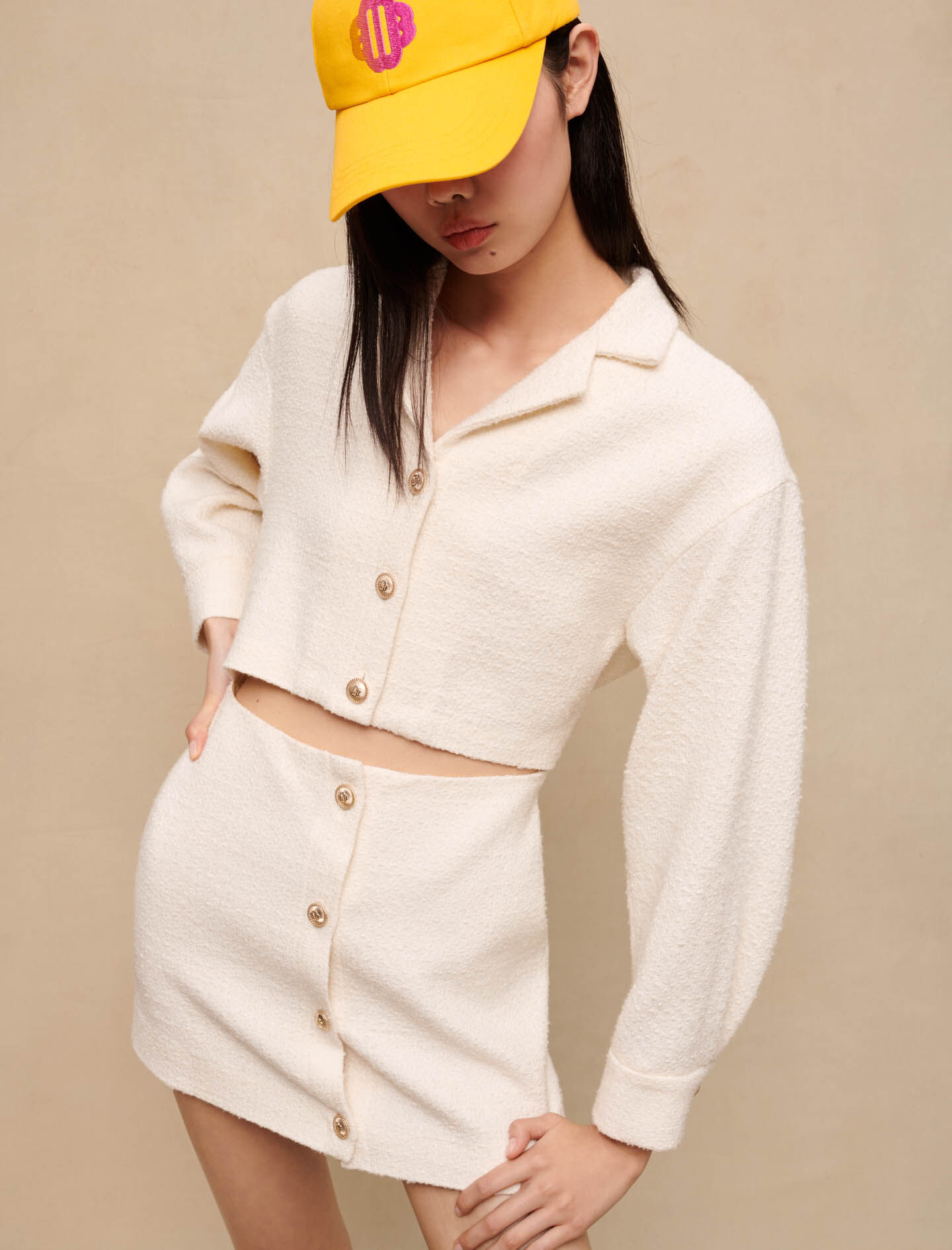 Katoenen pet met het Clover-Jaune soleil logo.