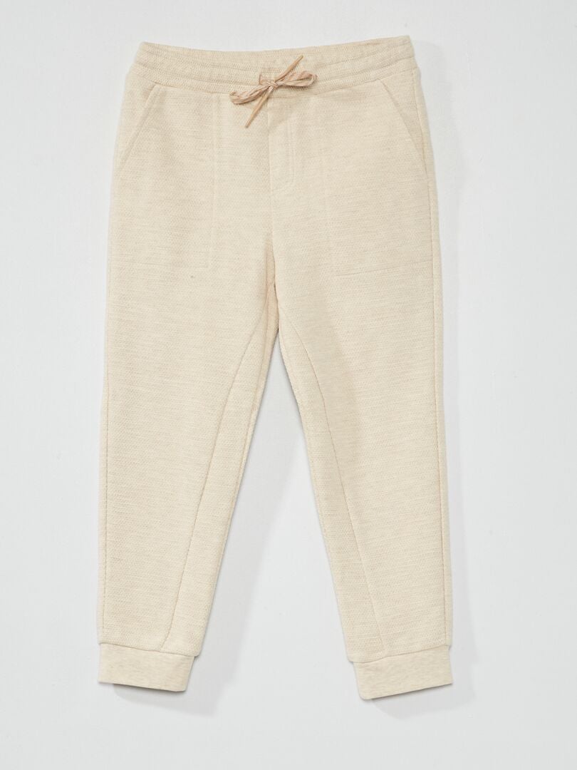 Joggingbroek van katoenpiqué - lossere pasvorm - beige
