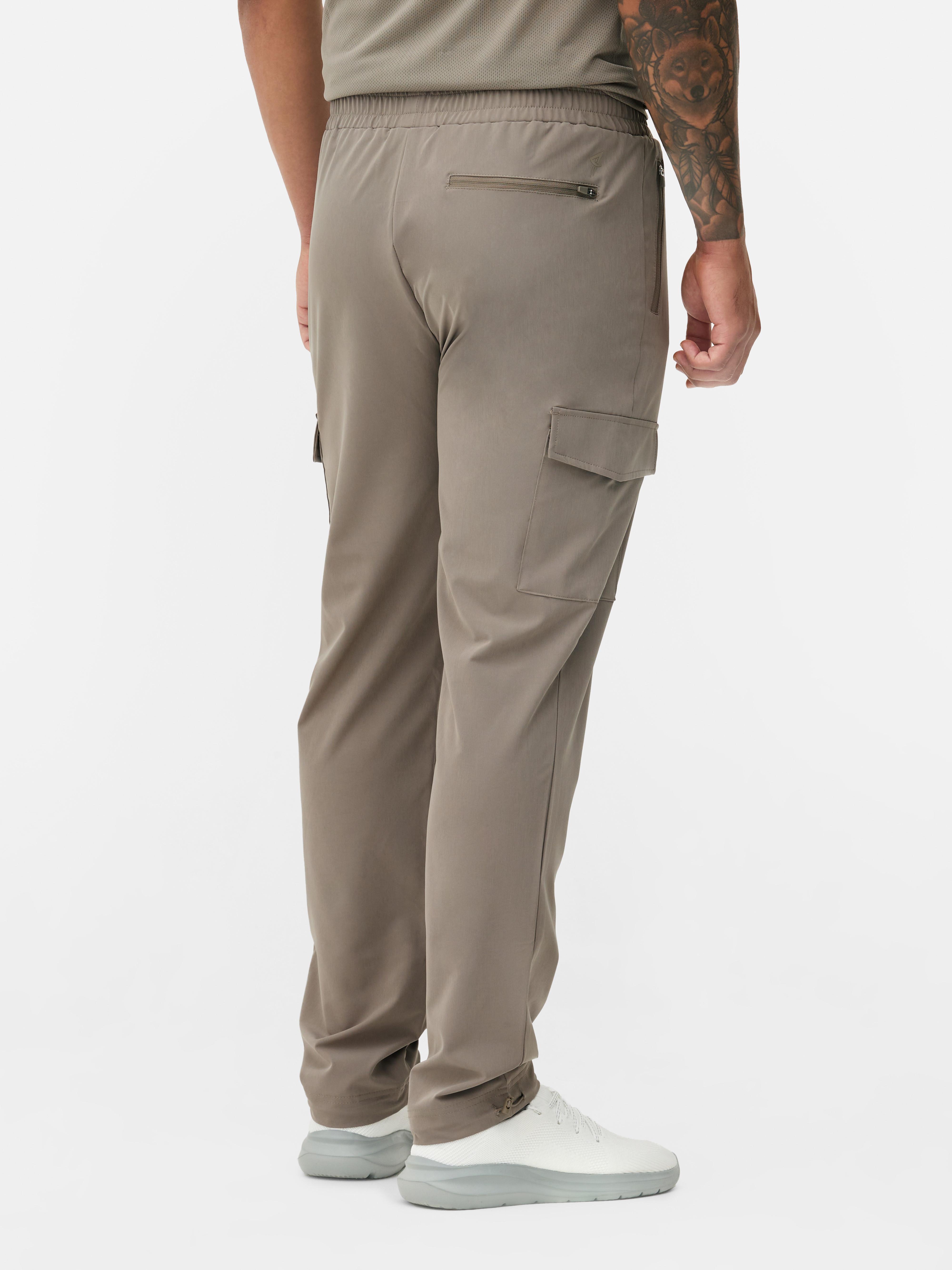 Woven cargo sweatpants Woven sweatpants with stretchy waist, cargo pockets and adjustable ankle cuffs