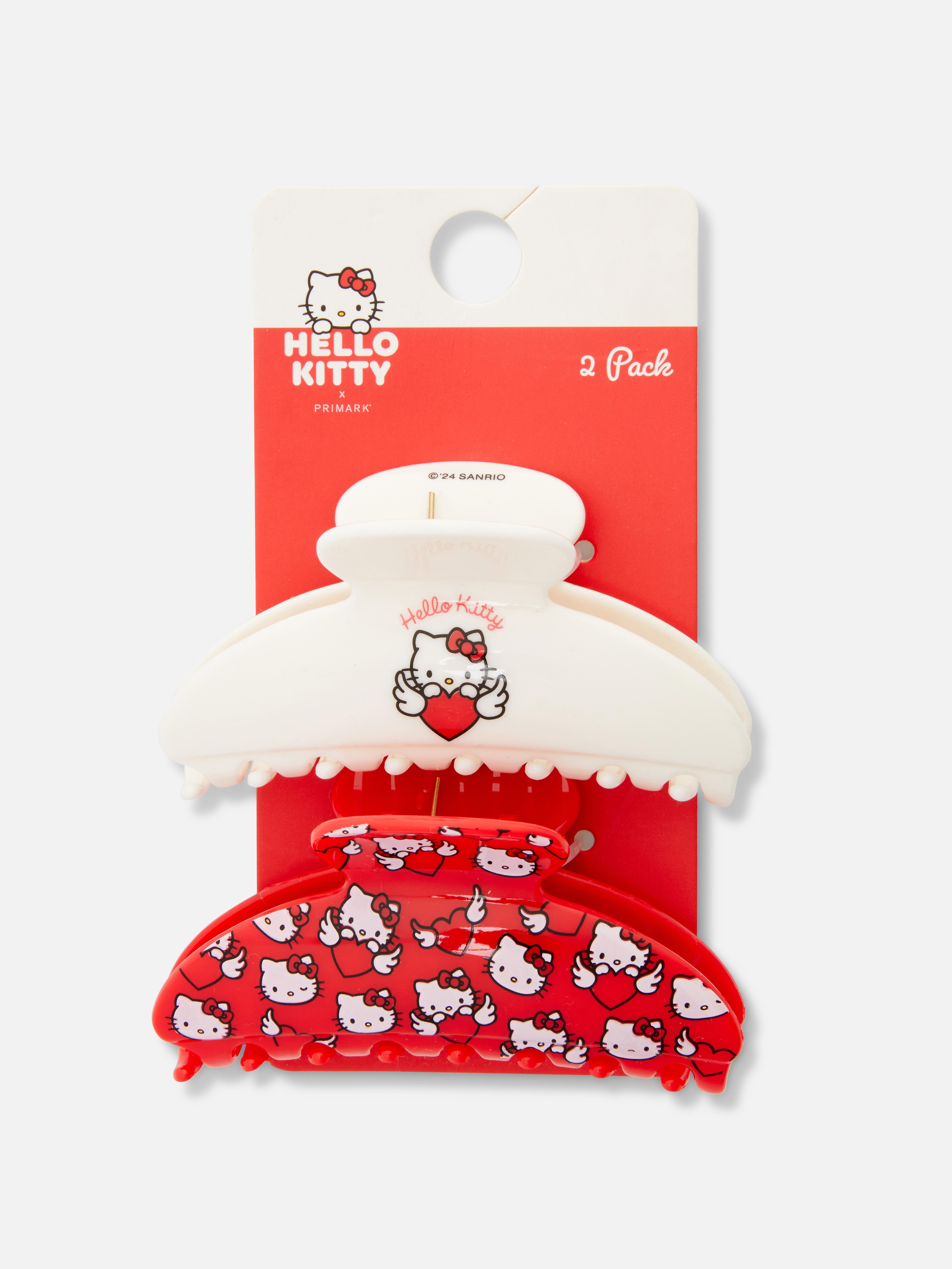 Agrafe de păr Hello Kitty, set de 2. Două agrafe de păr cu un design Hello Kitty? Da, vă rog.