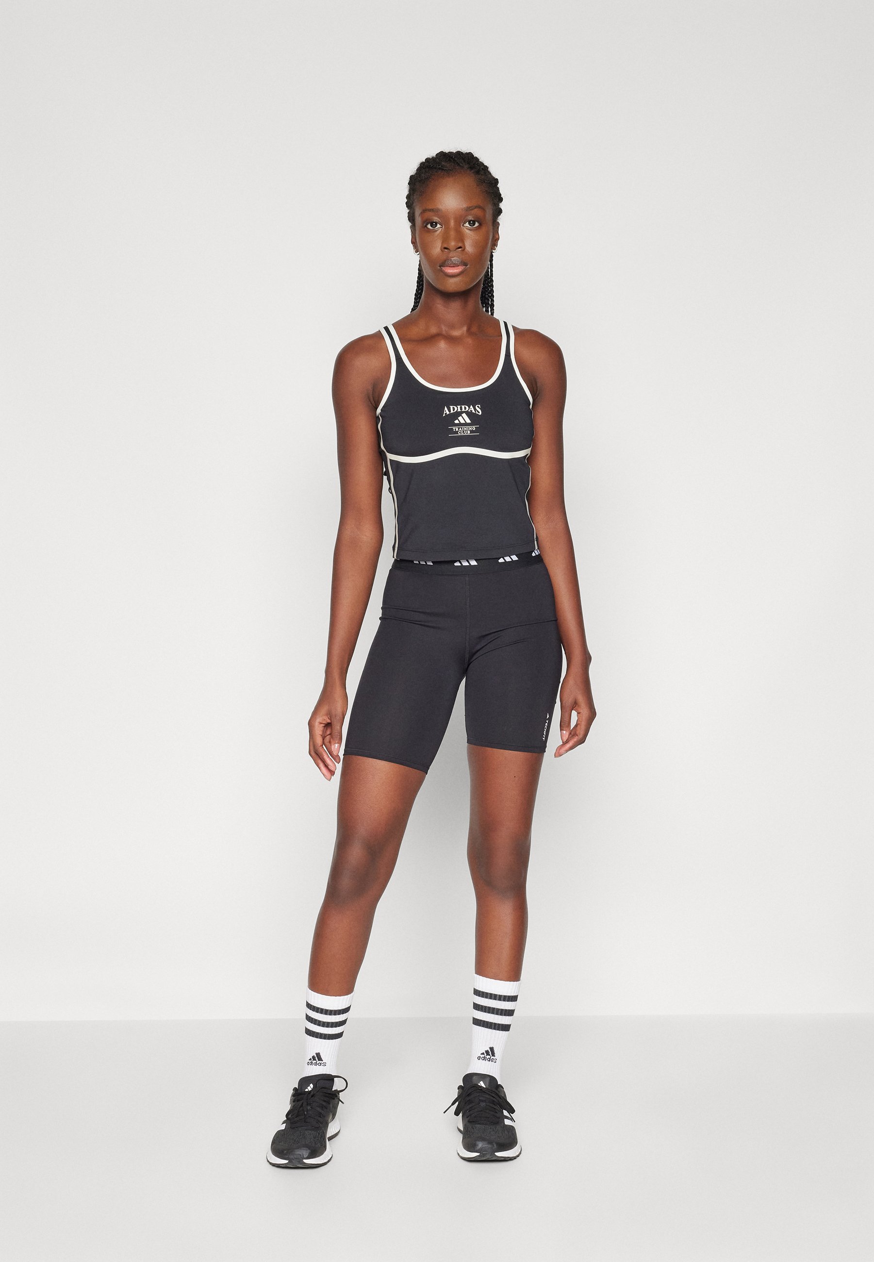 adidas Performance HERITAGE MET GEÏNTEGREERDE LAGE ONDERSTEUNING - Sportbeha met lichte ondersteuning - zwart/krijtwit