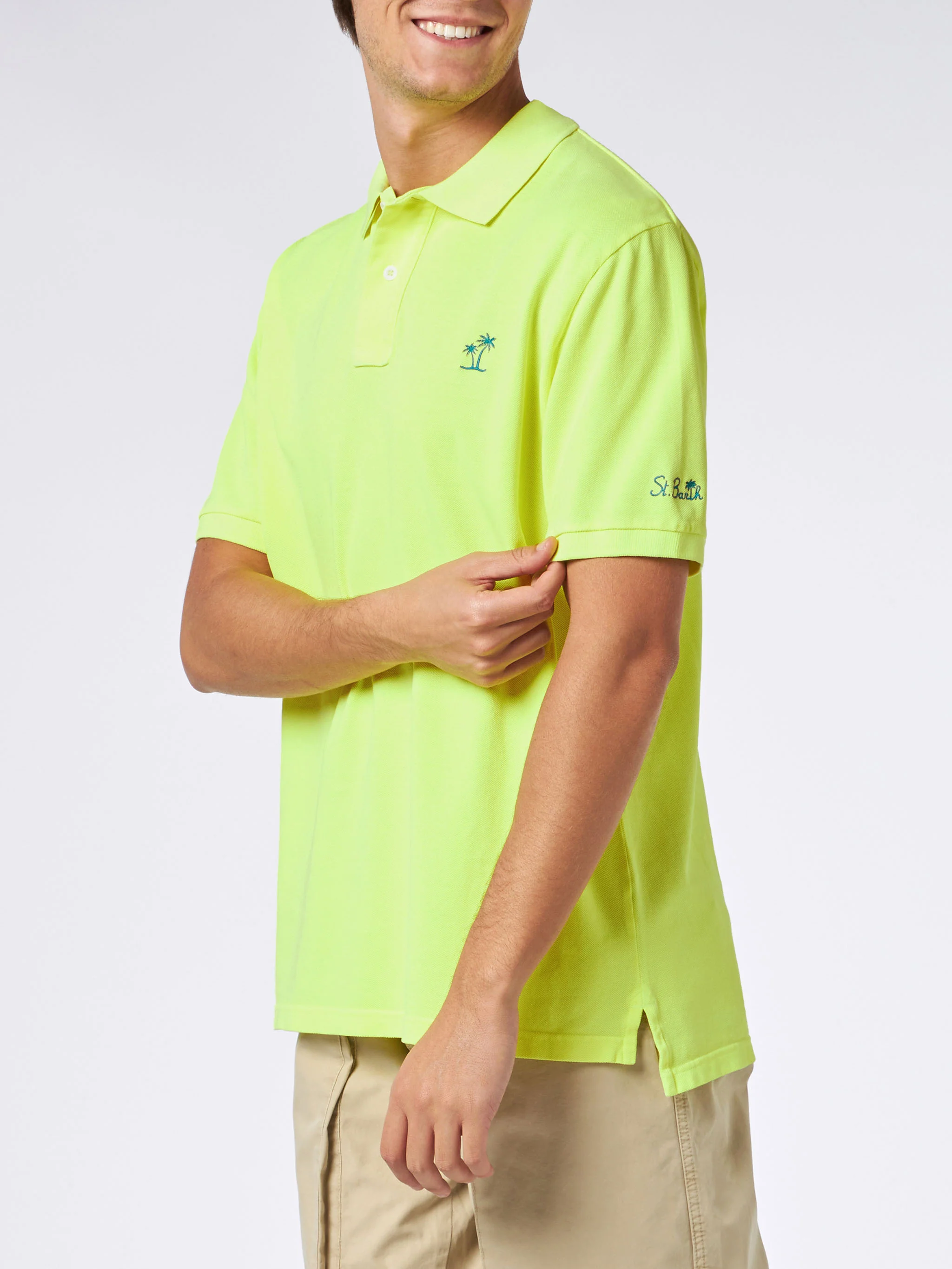 Polo da uomo in piquet giallo fluo con logo St. Barth ed effetto vinta