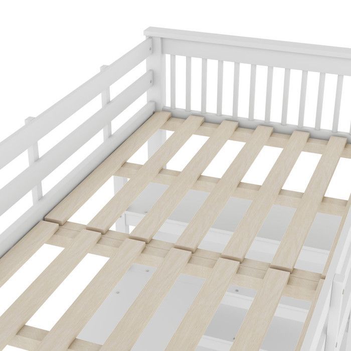Cama alta infantil de 90x200 cm con escritorio y estante de almacenamiento en madera maciza, color blanco.