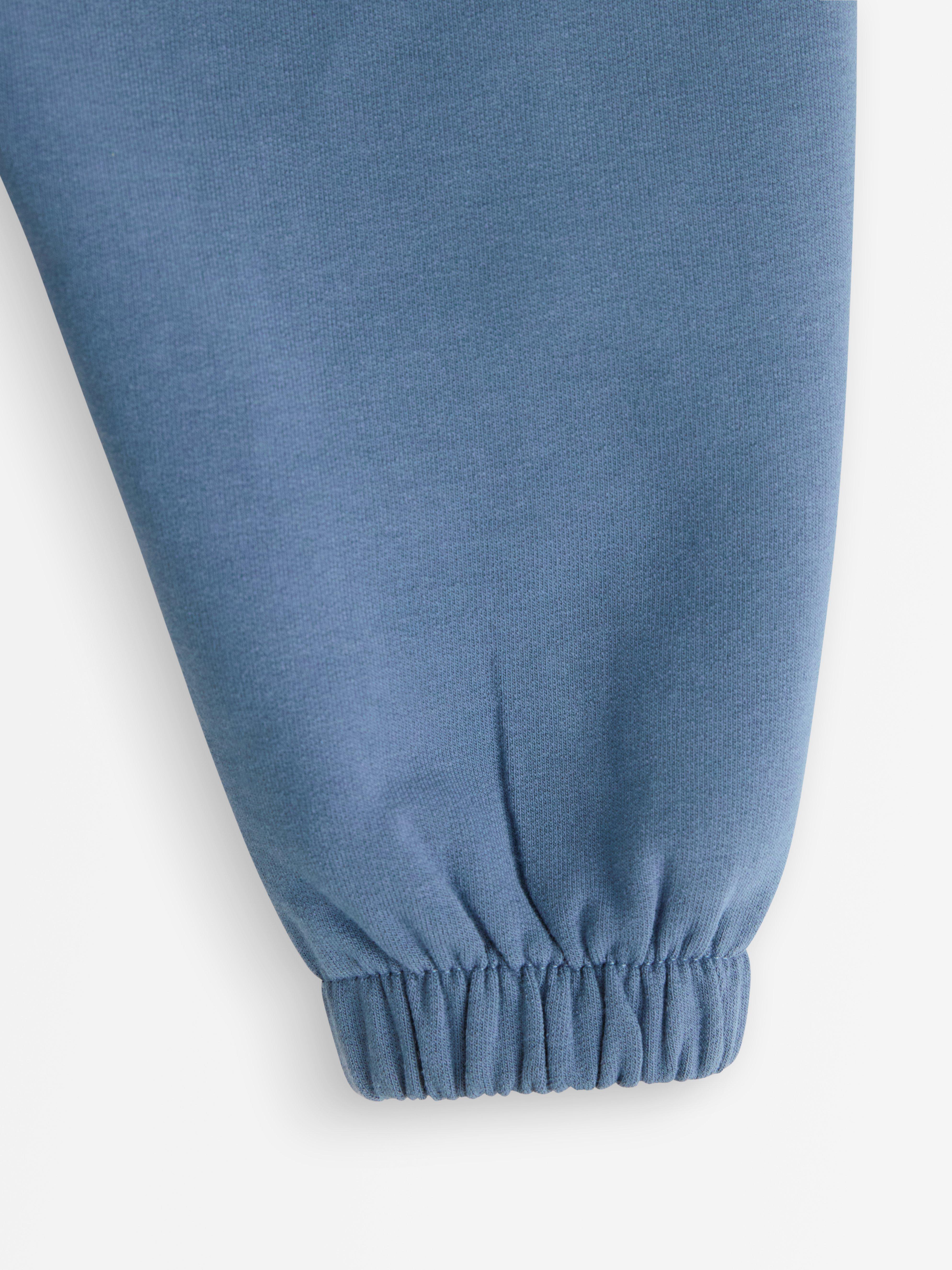 Pantalones deportivos con interior cepillado, color azul oscuro empolvado.