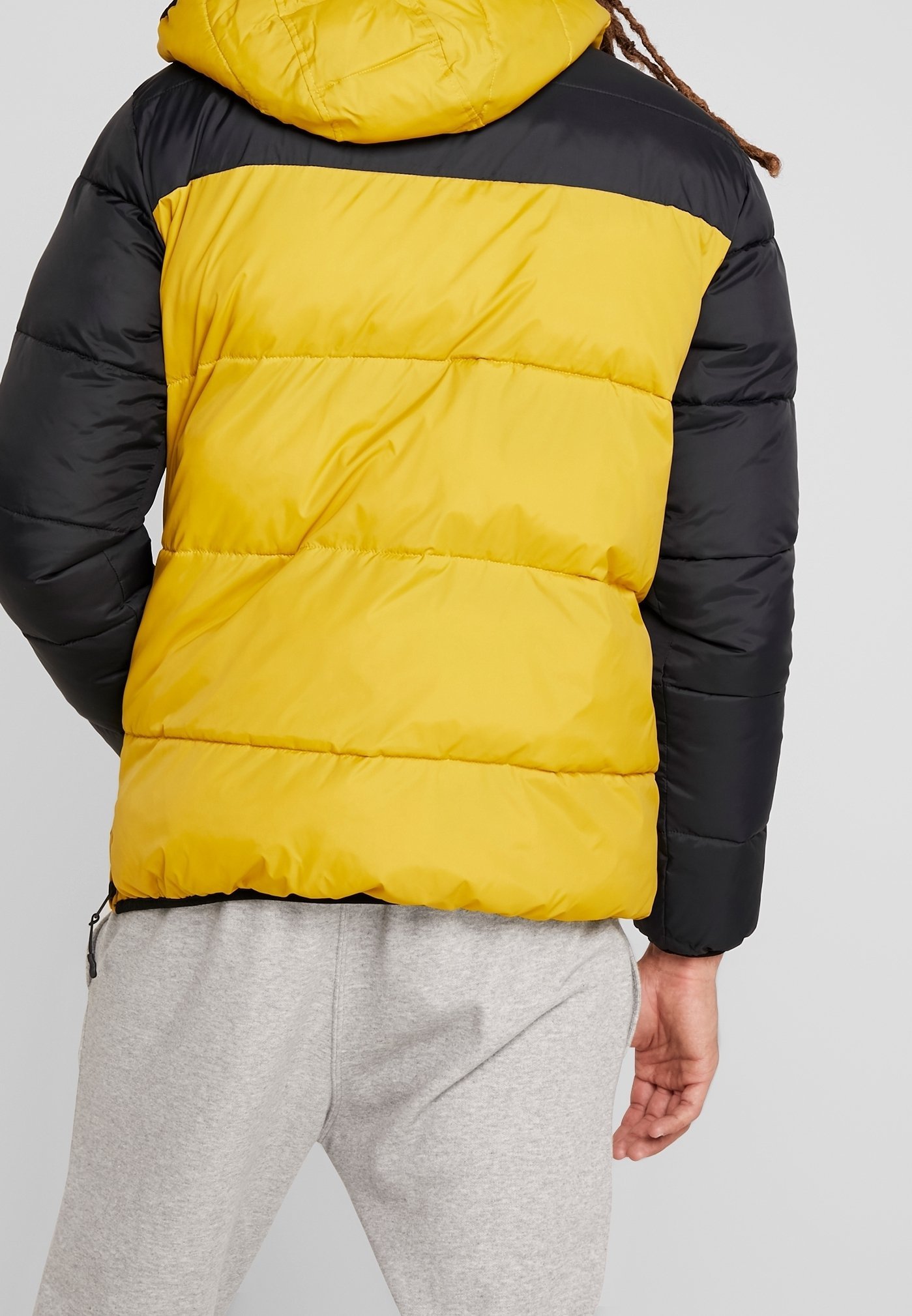 Champion winterjas - mosterdgeel
