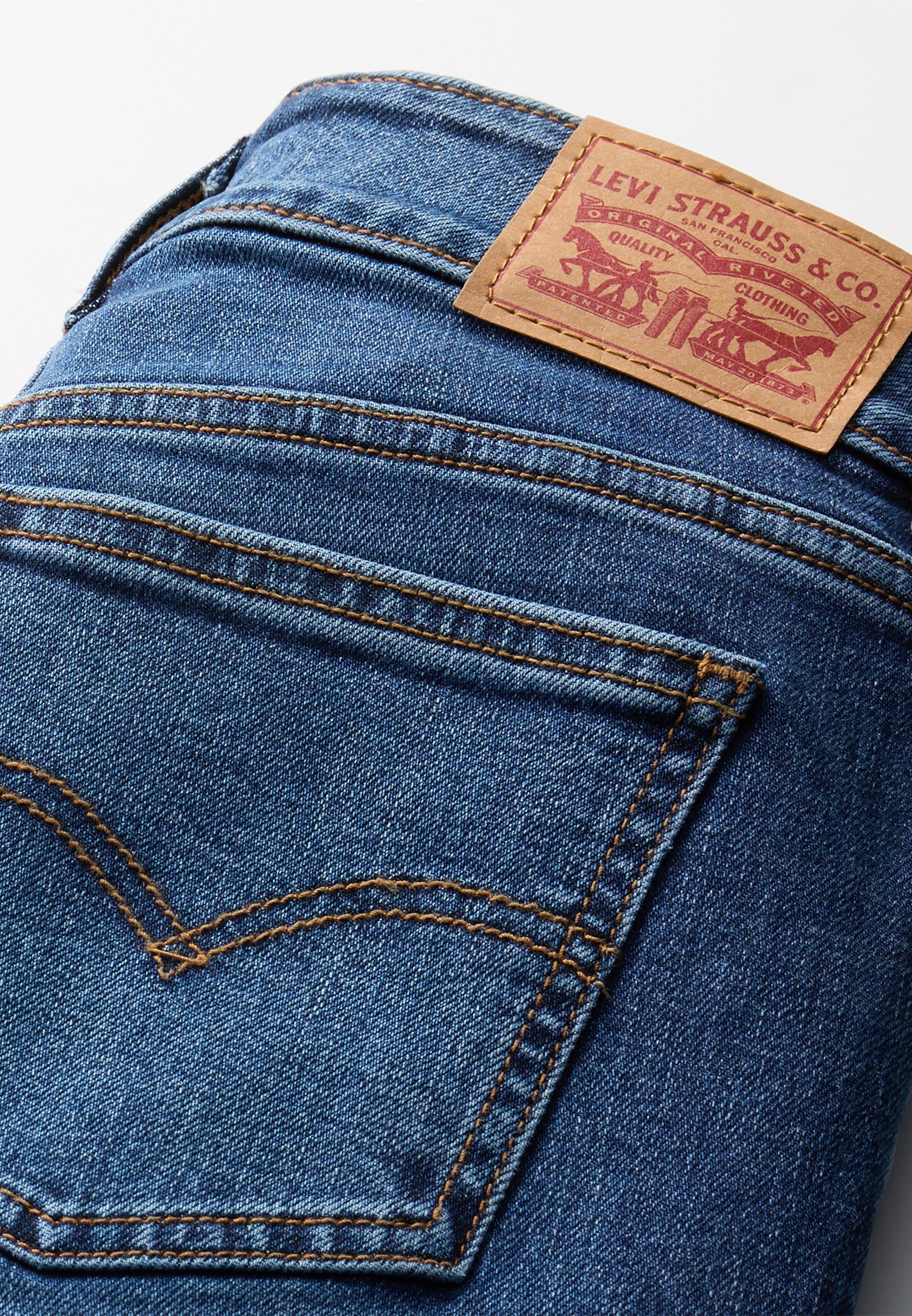 Levi's® SUPERLOW FLARE - Uitlopende jeans - helende kracht