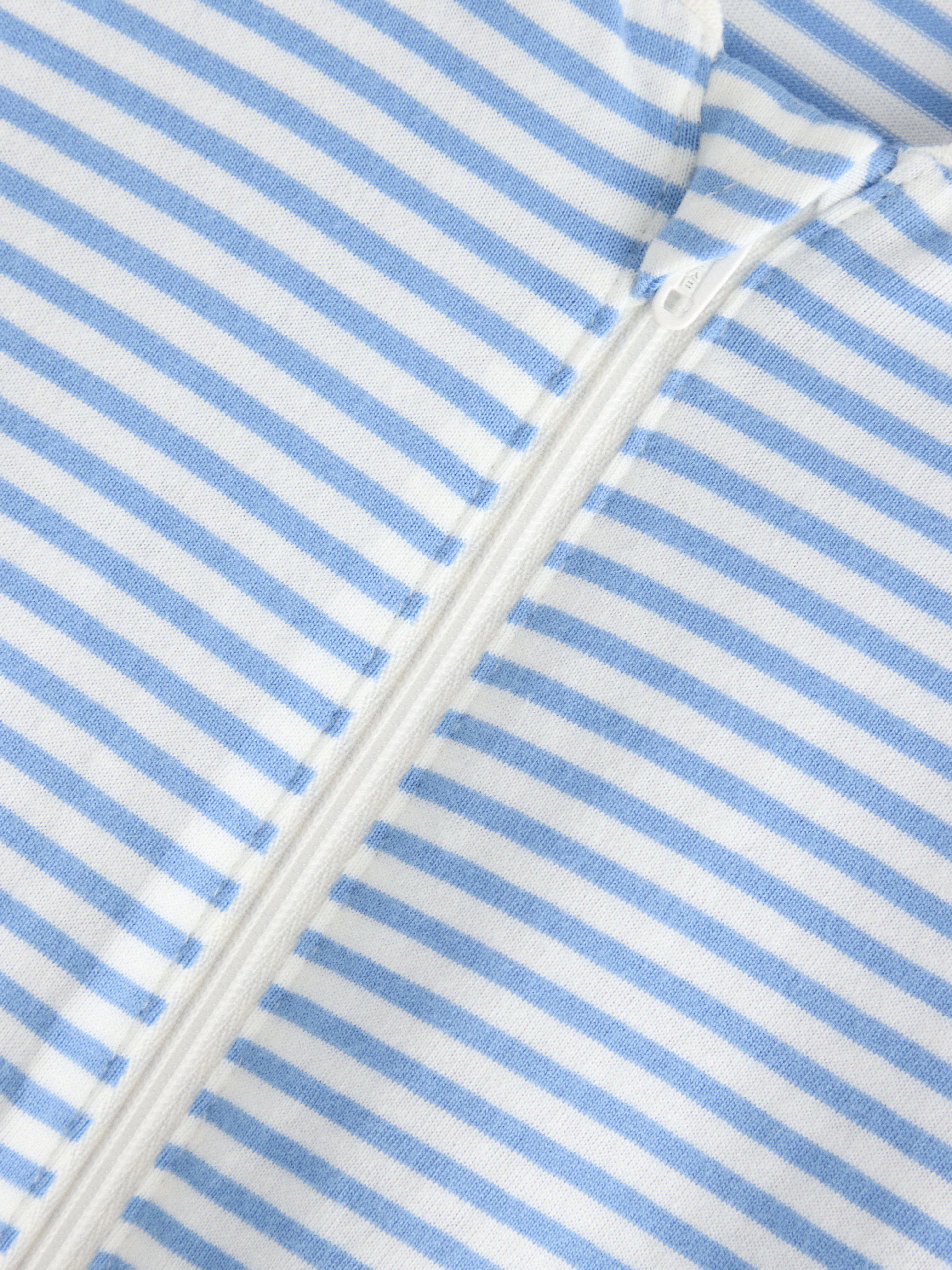 Macacão de pijama azul claro