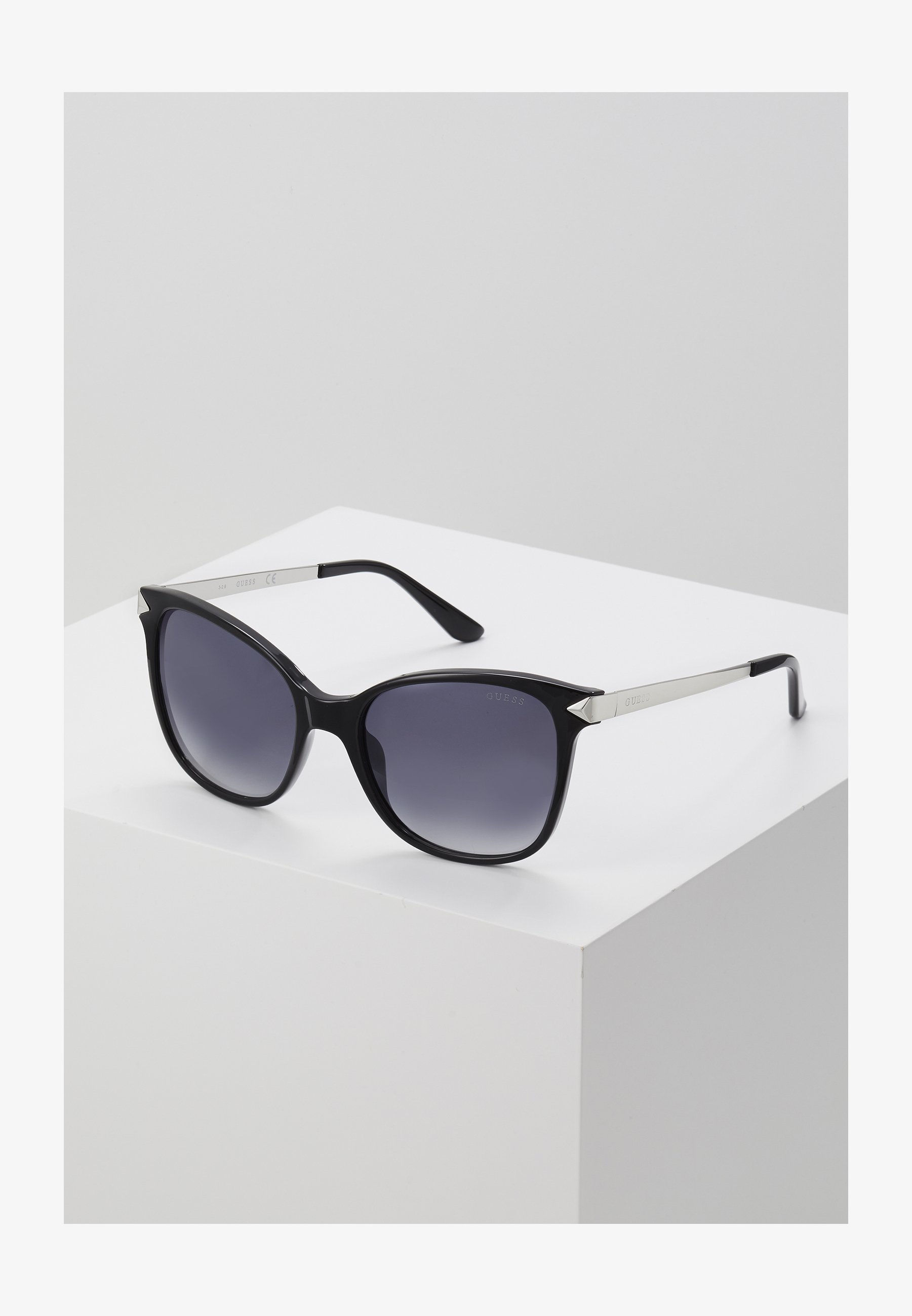 Lunettes de soleil Guess - noires
