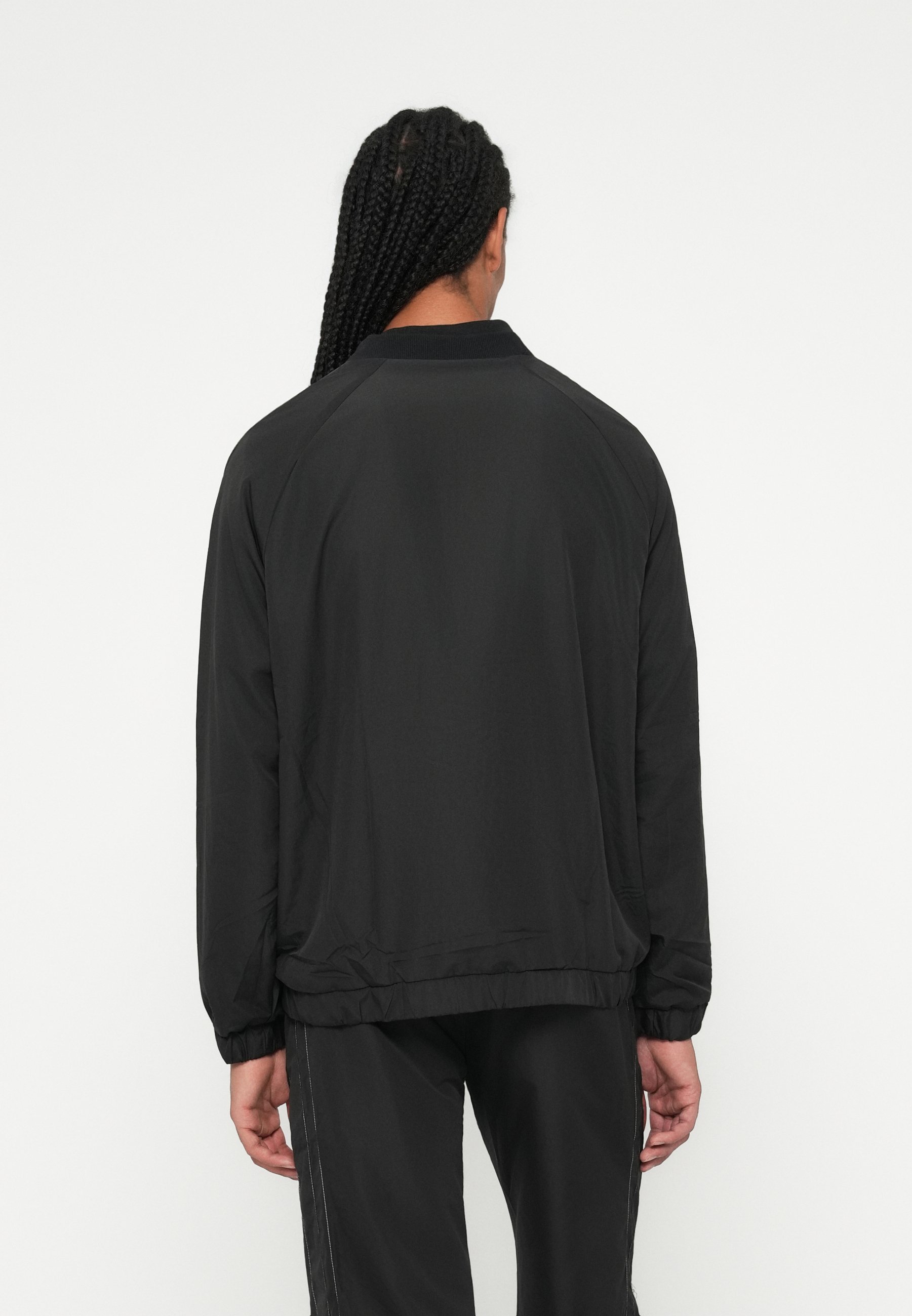 Sweat-shirt réversible Umbro - noir