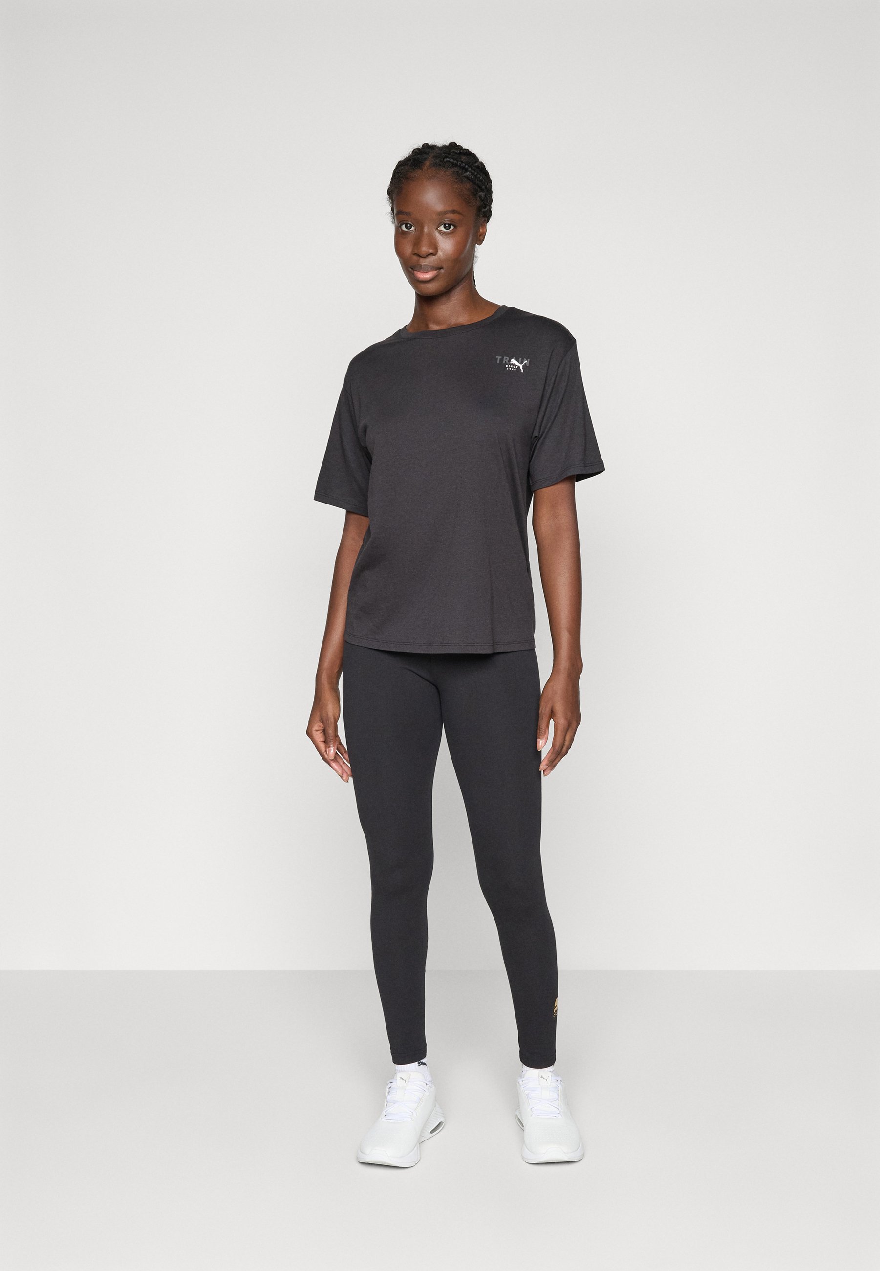 Puma PRETTY TOUGH GRAPHIC TEE - Sport T-shirt - zwart