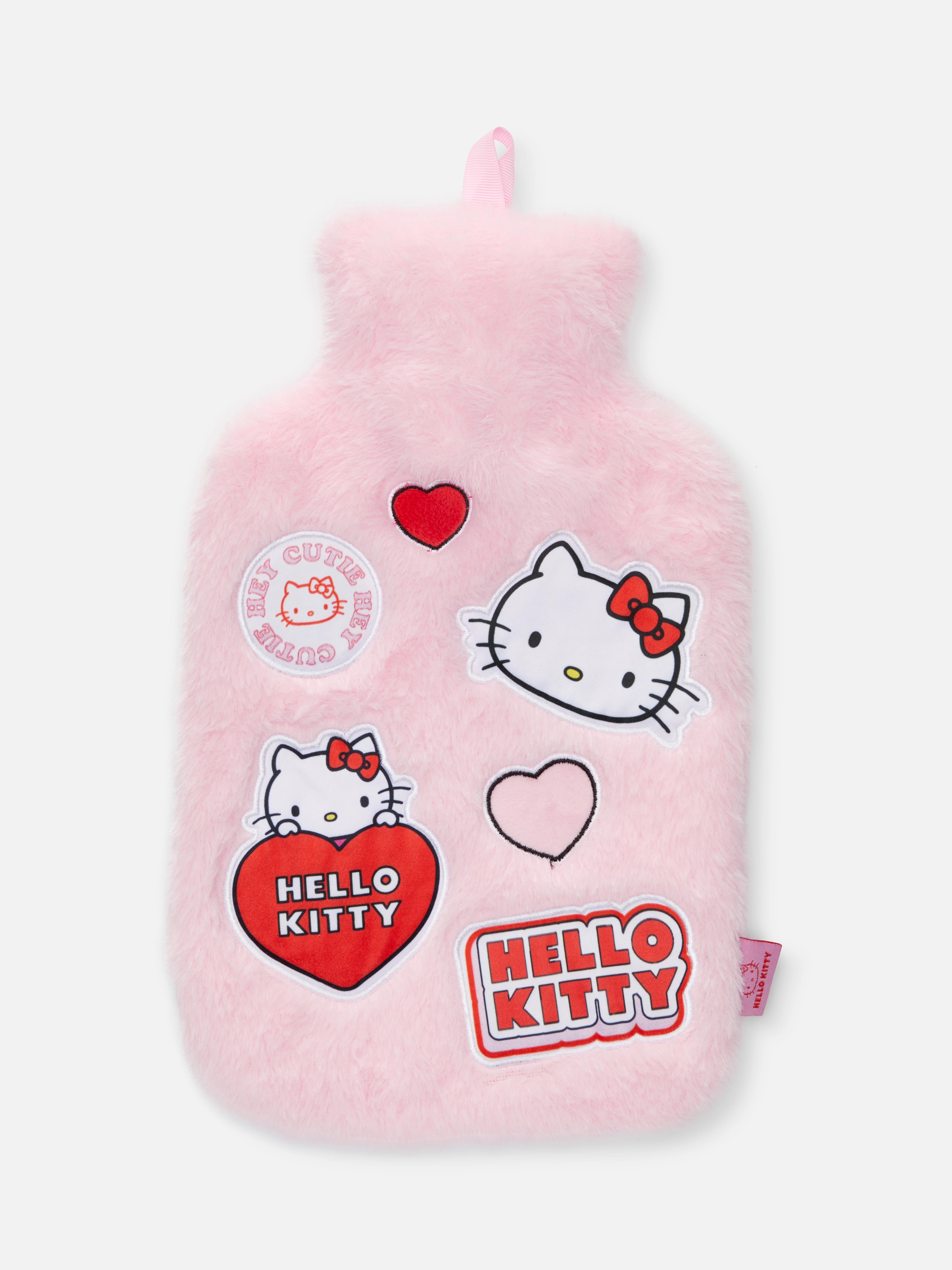 Sticla cu apă caldă Hello Kitty O sticlă cu apă caldă cu o husă moale Hello Kitty și detalii aplicate