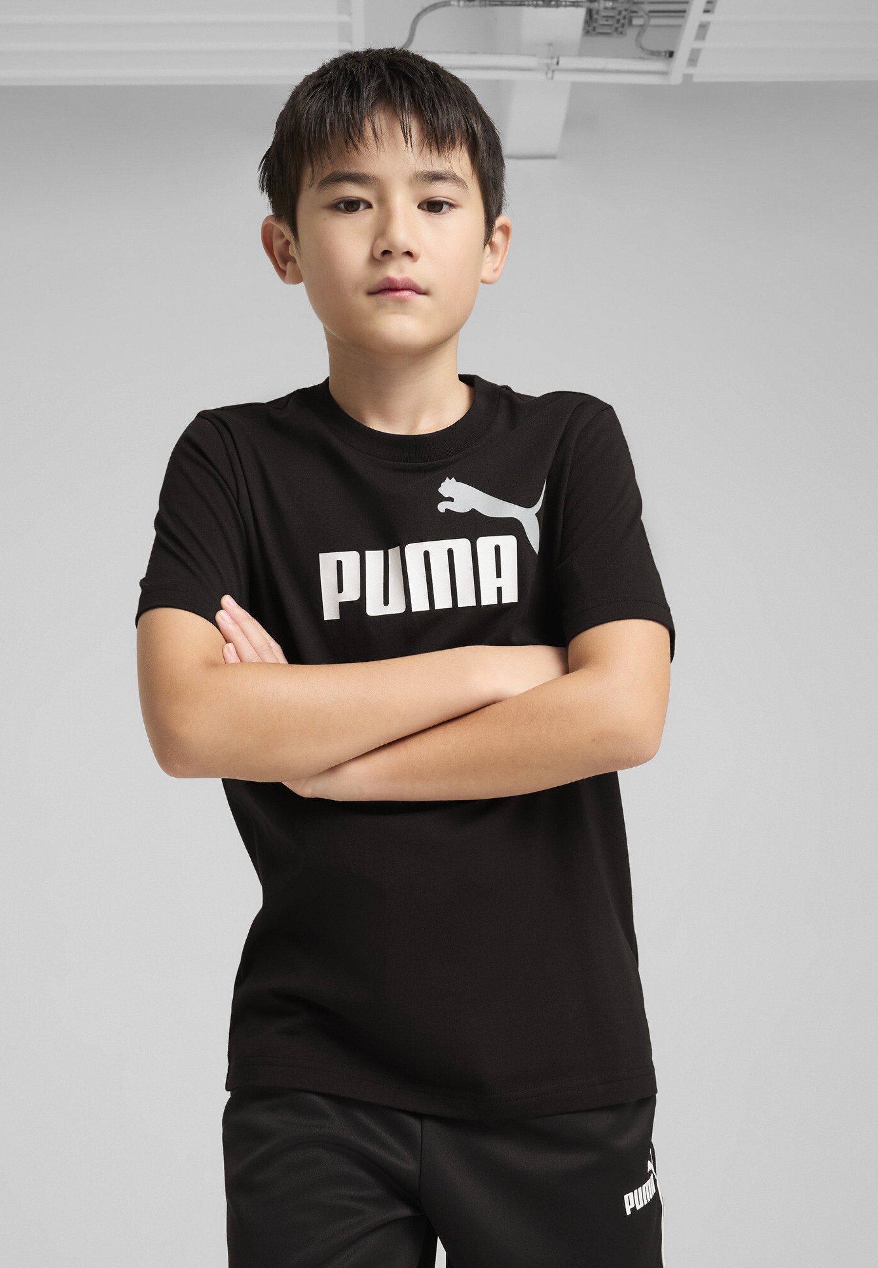 Puma LOGO TEE UNISEX - Nyomott mintás póló - fekete