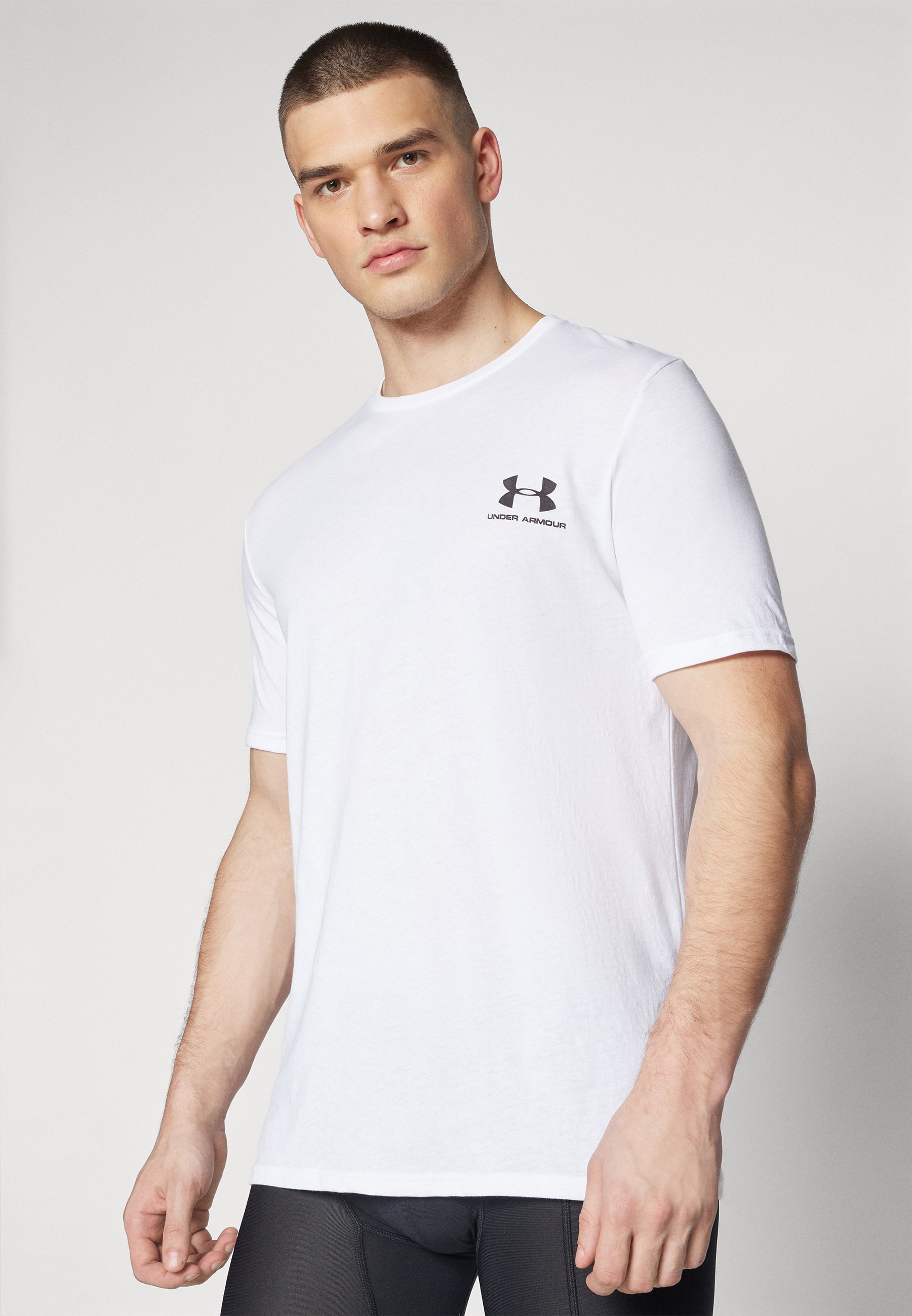 Maglietta Under Armour con logo stampato sul petto a sinistra - bianco/nero