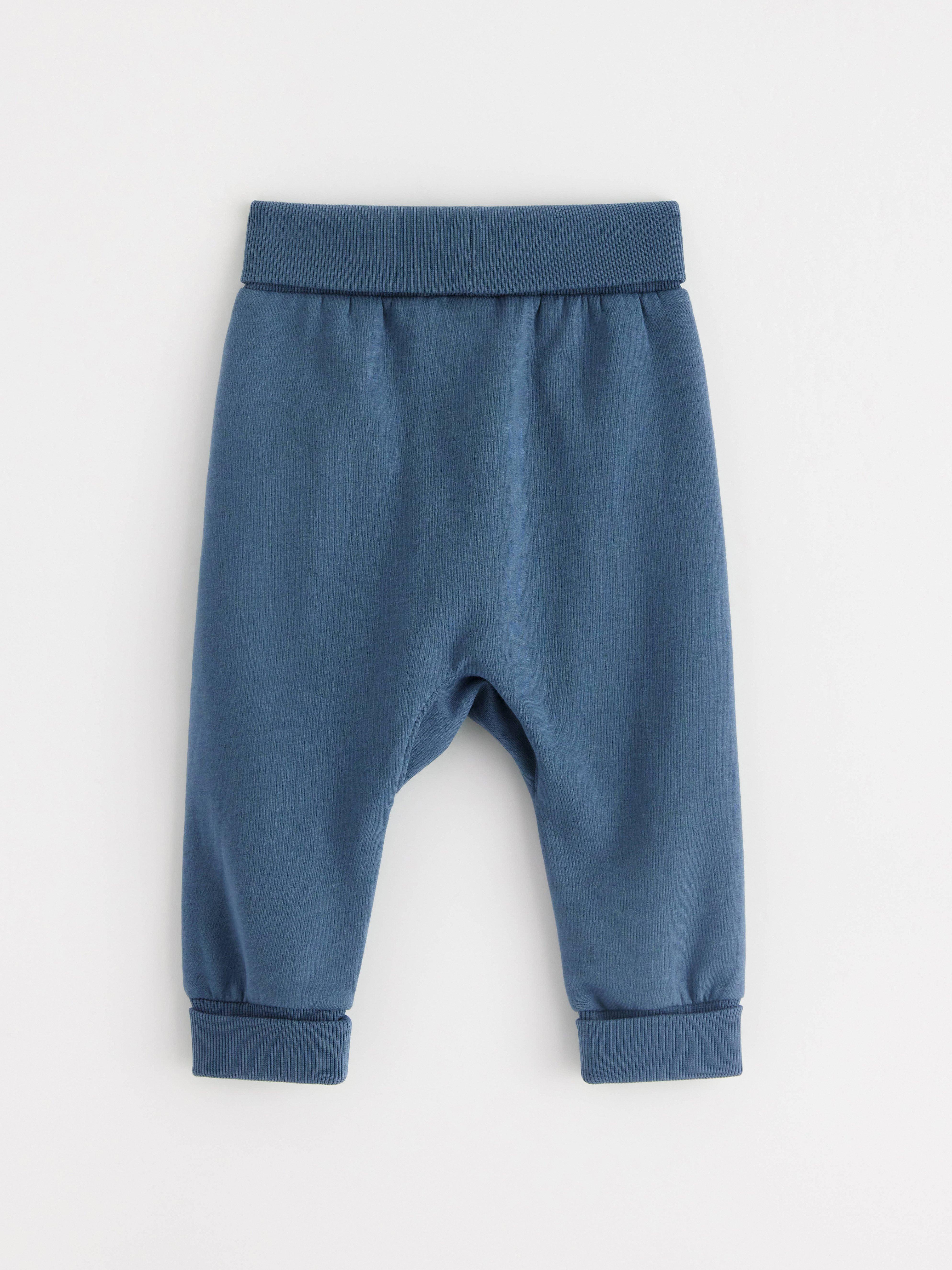 Pantalones deportivos azul oscuro empolvado