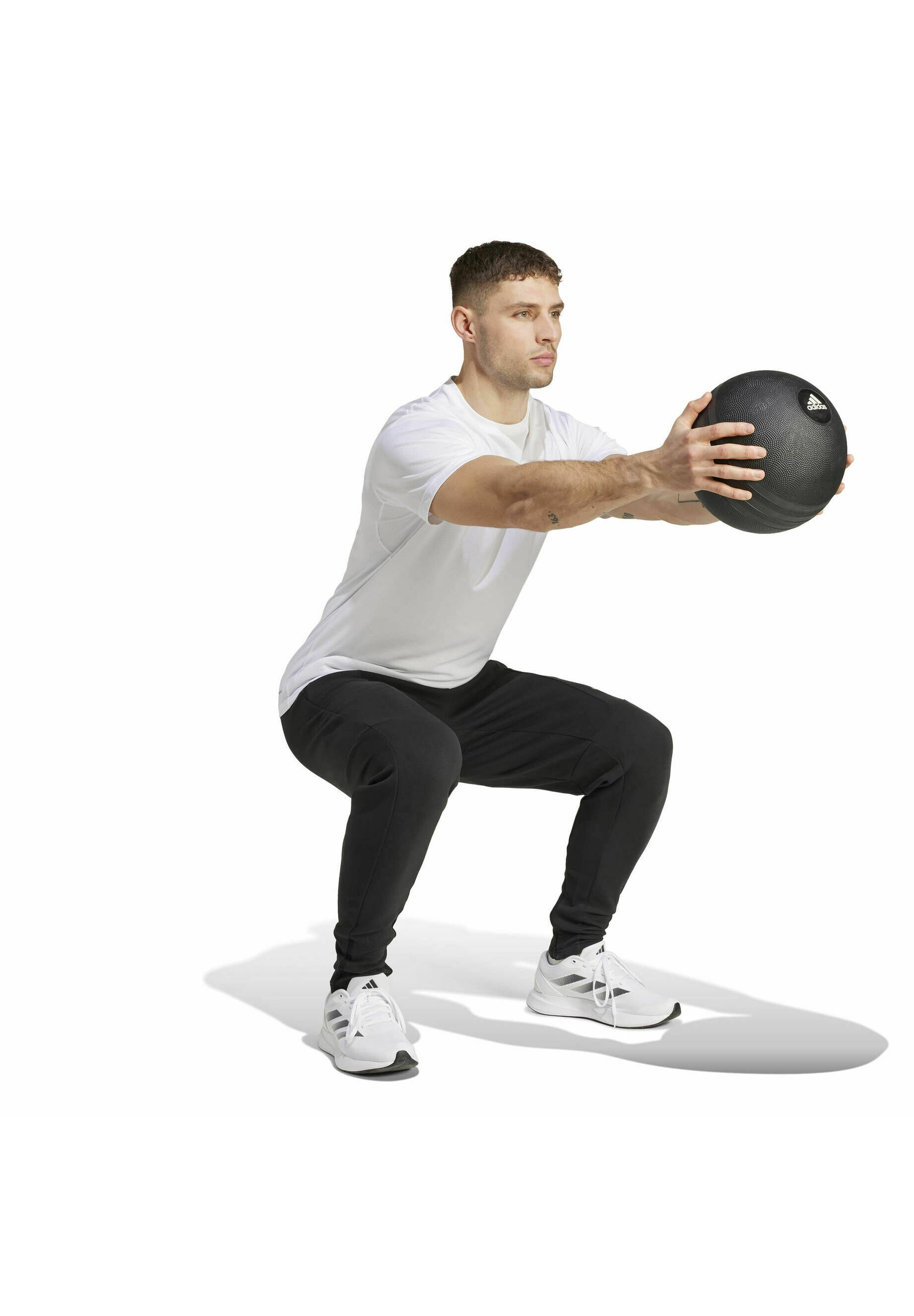 Calça de fato de treino adidas Performance - preta