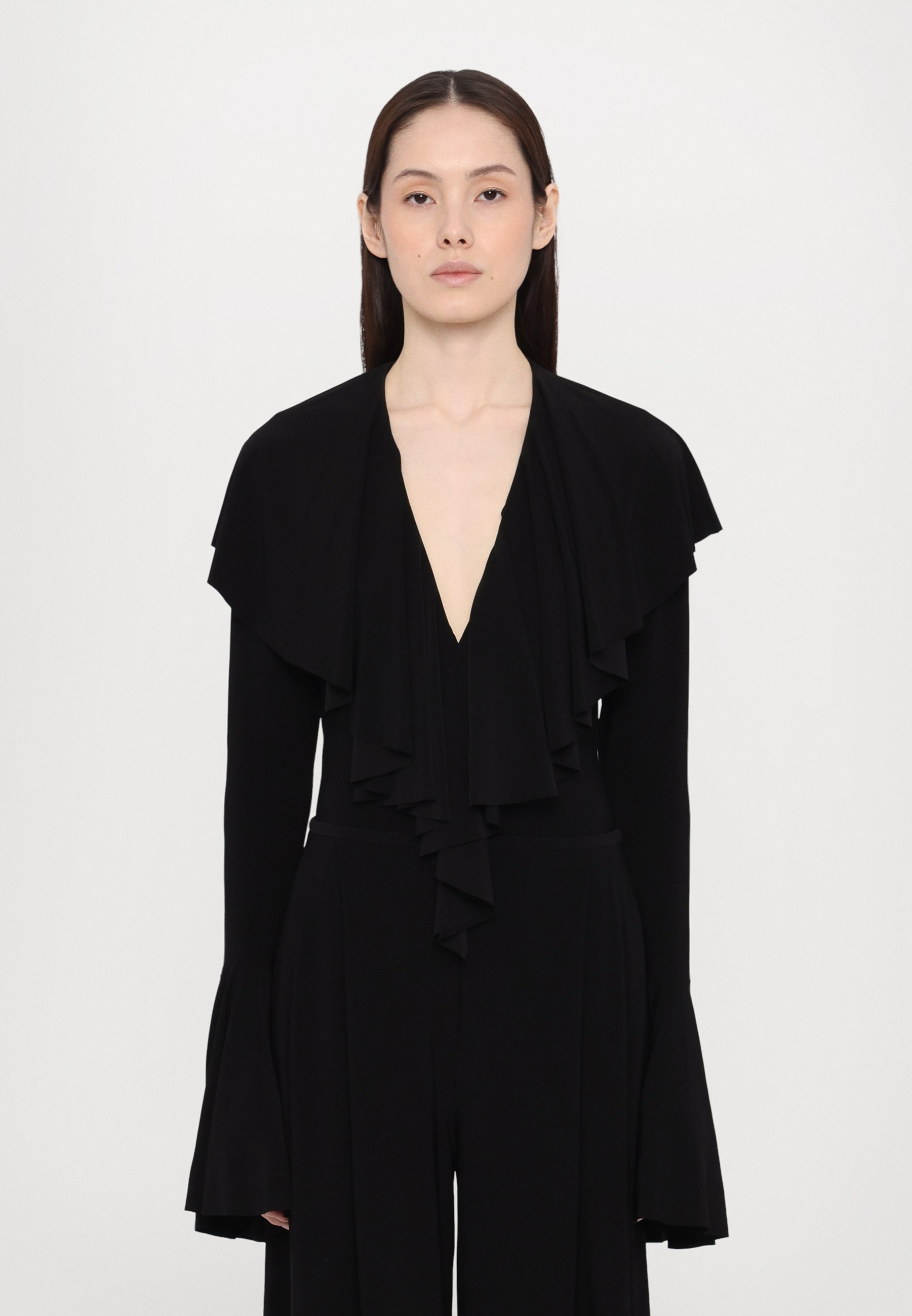 Norma Kamali Bodysuit met lange mouwen, diepe V-hals en ruches - Top met lange mouwen - zwart