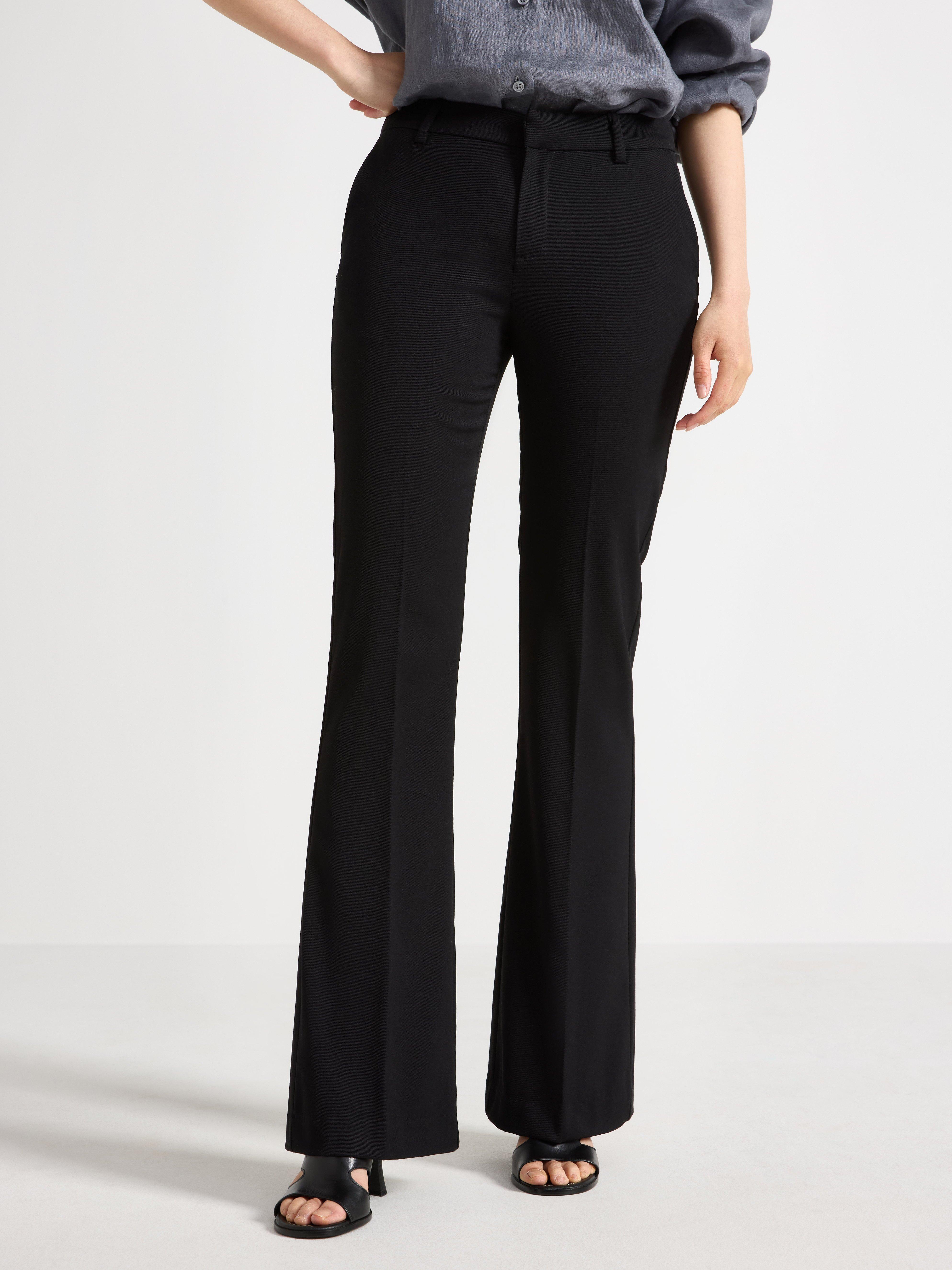 Pantalones acampanados FIONA con perneras extralargas, color negro.
